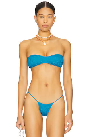 Meeyah Solid Smocked Bandeau Bikini Top
                    
                    Indah
          ... | Revolve Clothing (Global)