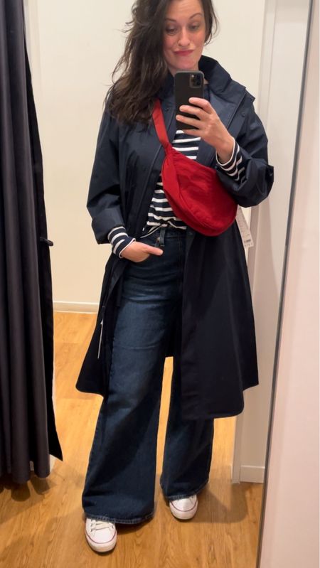 • Navy blocktech windbreaker #uniqlo (linked)
• Navy breton top #monoprix 
• Flare jeans #levis (linked)
• White leather high tops #converse (linked)
• Red fanny pack #uniqlo (linked)