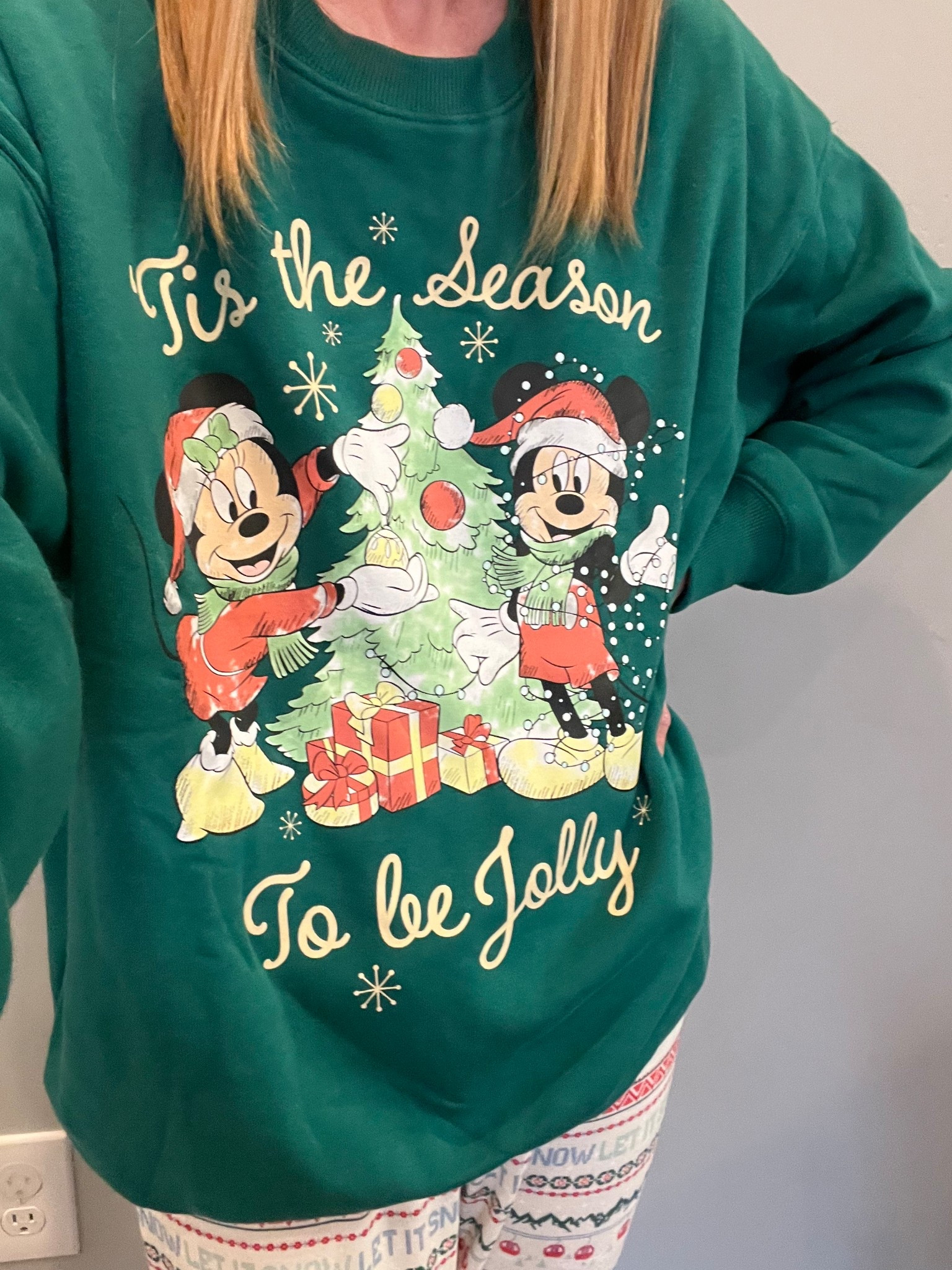 Cozy Disney Christmas outfit with a Mickey & Minnie sweatshirt and holiday pajama pants. I’m wearing size XS in the sweatshirt and pants  

#LTKHoliday #LTKootd #LTKgrwm