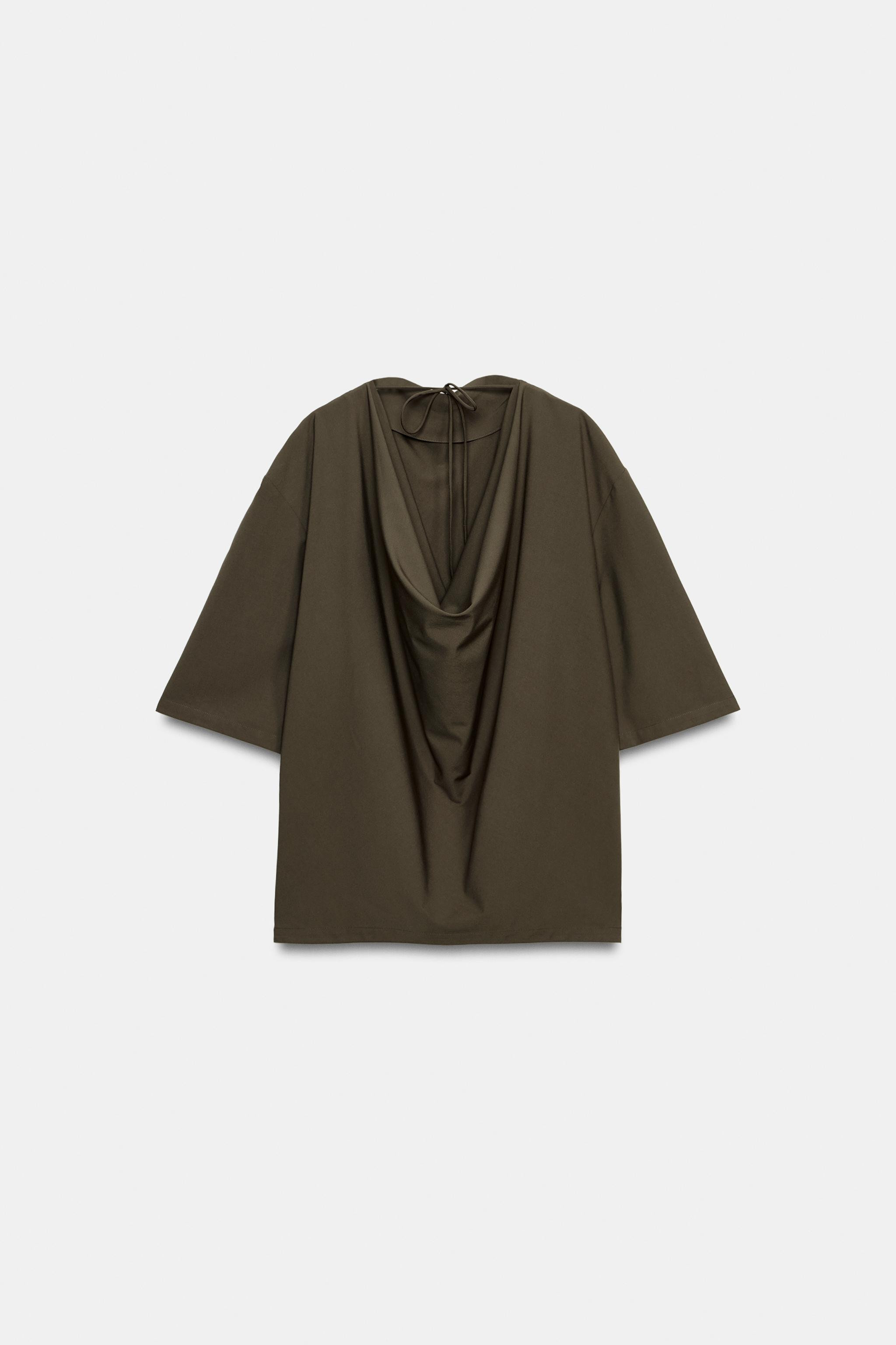 ZARA WOMAN COLLECTIONFlowy top made from viscose yarn. Round neck and short sleeves. Straight hem... | Zara US
