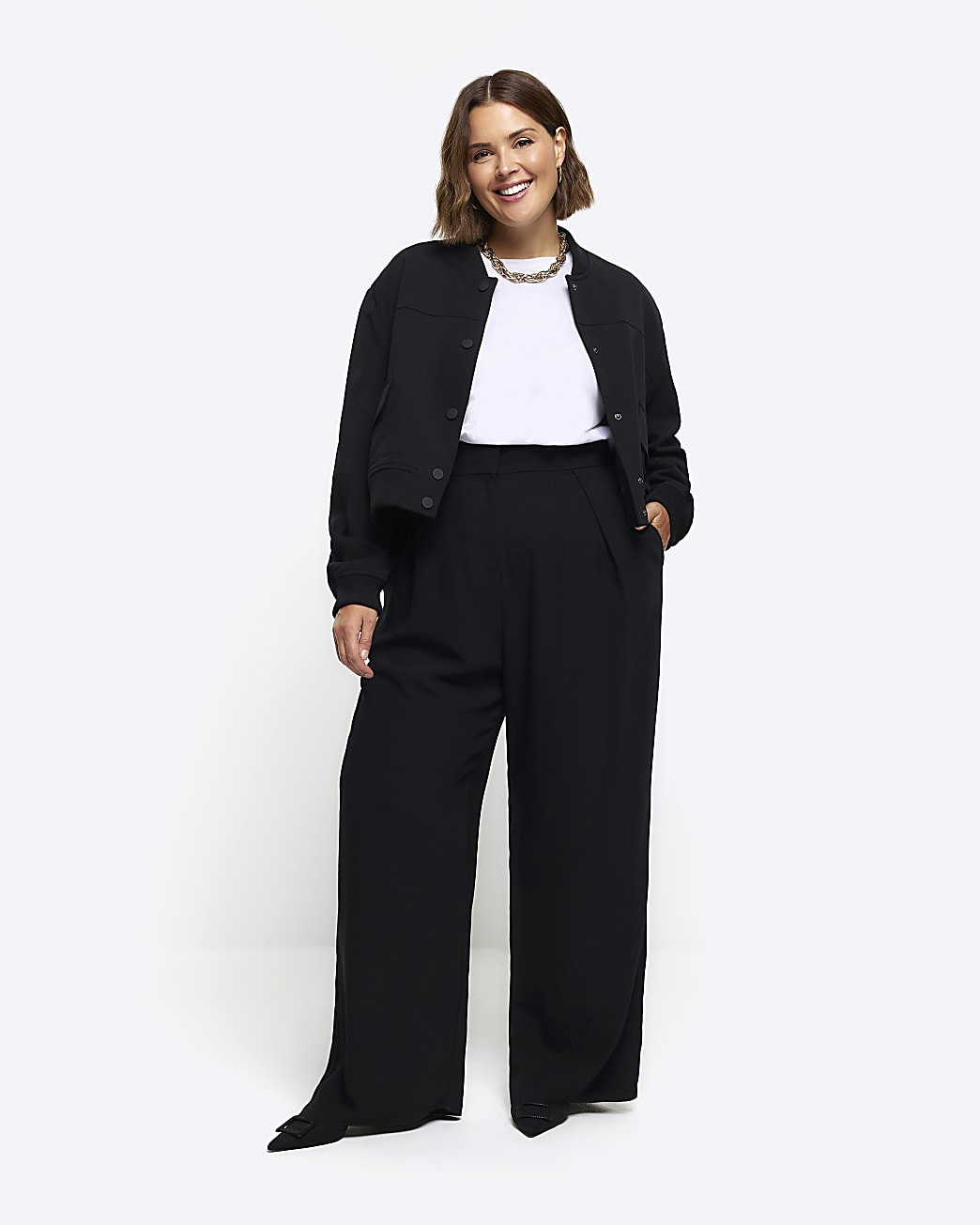 Black pleated wide leg trousers | River Island (US)