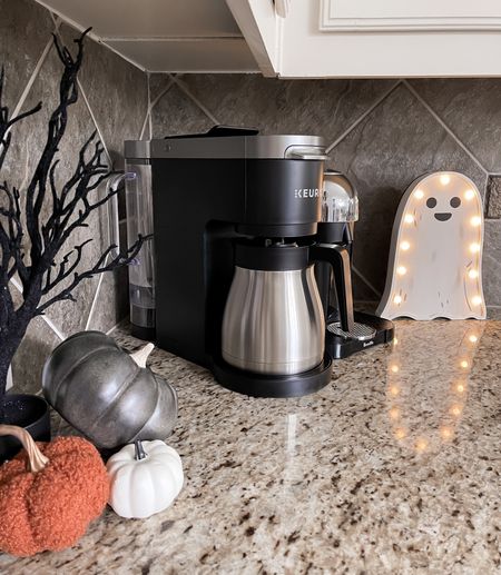 Went light on the Halloween decor this year with the move but linking how to get our kitchen decor look! You could add some spiderwebs etc too to make it extra festive

(Coffee bar, coffee setup, Halloween decorations, cutting board, cheese board, serverwear, serving tray, target finds, target deals, Walmart, Amazon finds, pumpkins, fall decor kitchen decor, home design, modern home, led sign, Halloween tree, seasonal decor, holiday decor, ceramic pumpkin, keurig, nespresso, wedding registry must haves, home styling, design tips) 

#LTKHalloween #LTKSeasonal #LTKstyletip