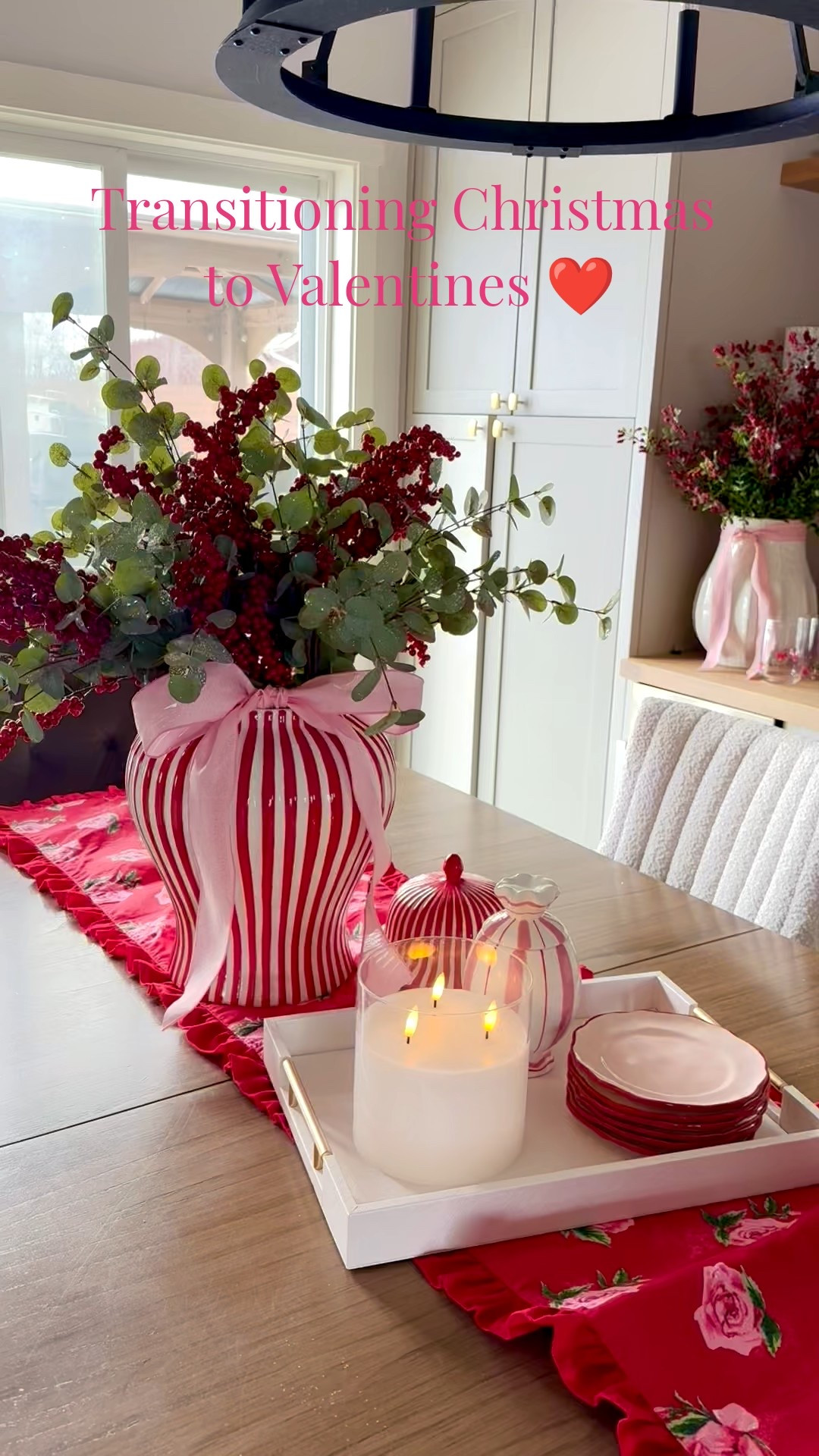 I left the Berry sprays in my vases, swapped out the greenery from Pine branches to eucalyptus and added some pink bows. Simple little changes that transform your space from Christmas to Valentine's. 