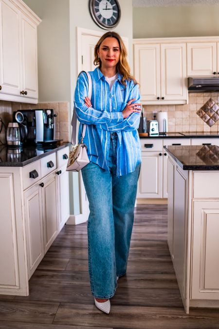 Spring outfit idea - wide high rise jeans, linen shirt, white tee.  

#LTKfindsunder100 #LTKover40 #LTKstyletip