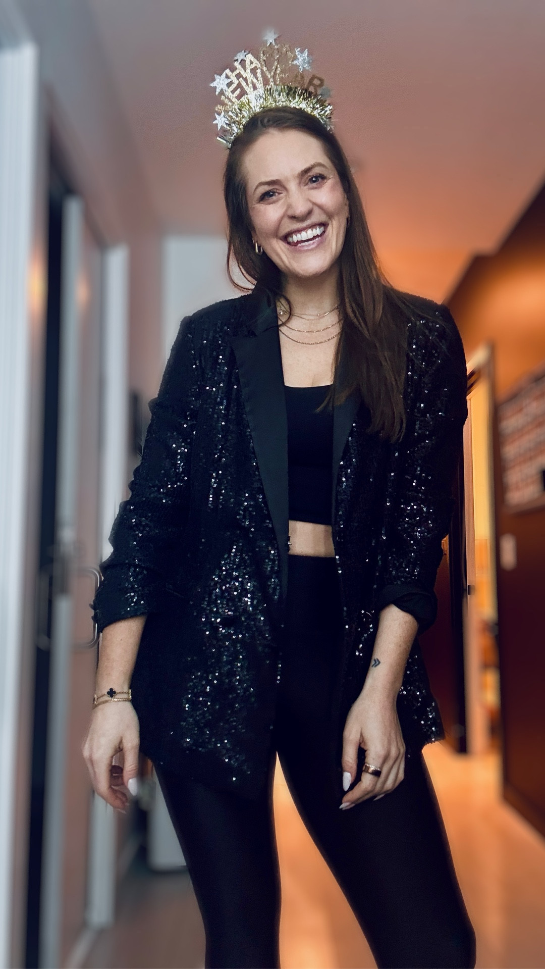 Dressed like a sequin to coach my NYE classes! If my clients are showing up to get strong at 5:30AM then I'm going to give them a smile. These black matte foil leggings hold me in tight and make me feel fierce. Happy New Year! 🎊🎆 🪩

#LTKmorningroutine #LTKfitnessgoals #LTKActive