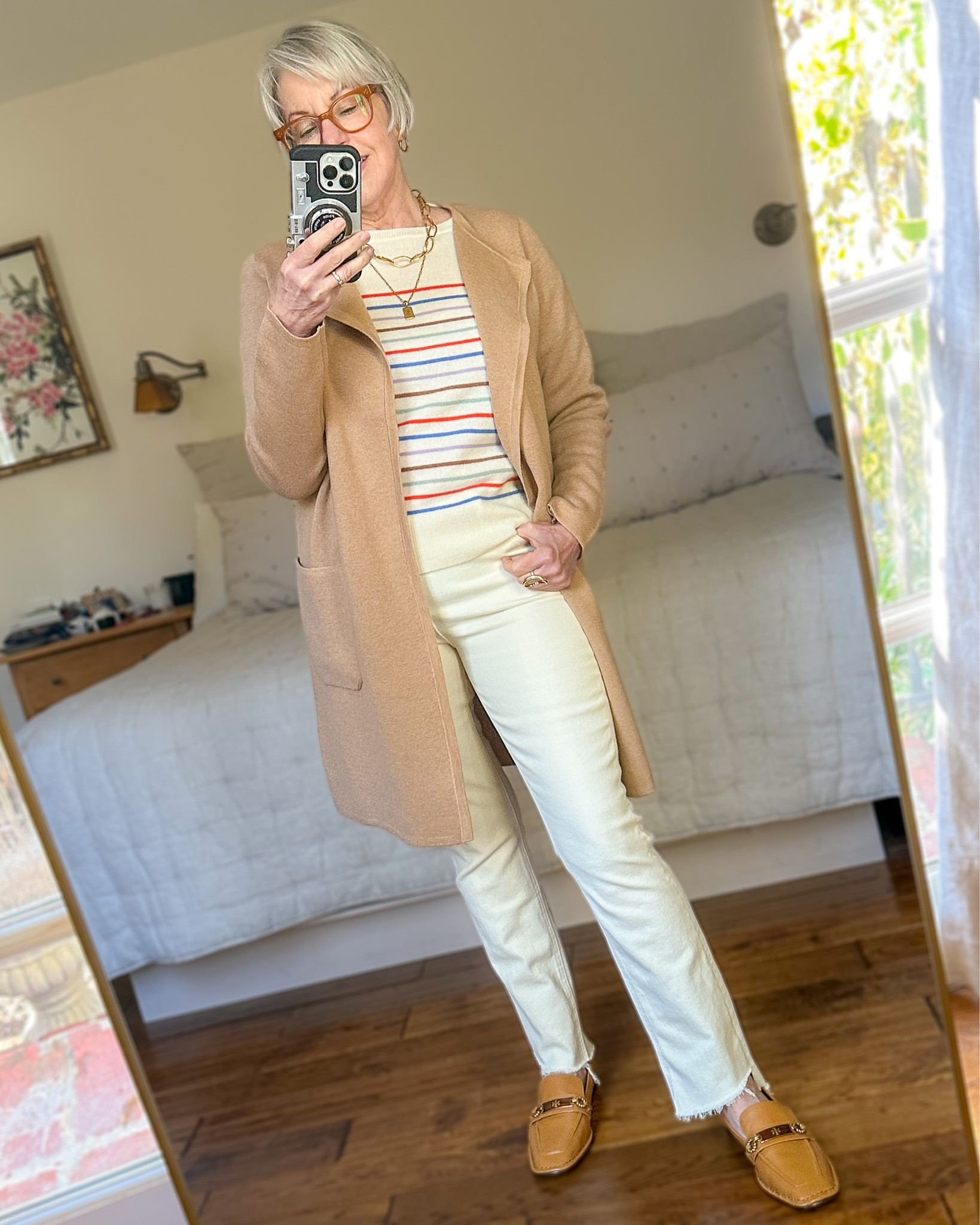 White jeans outfit with a striped sweater & long sweater jacket

#LTKSeasonal
