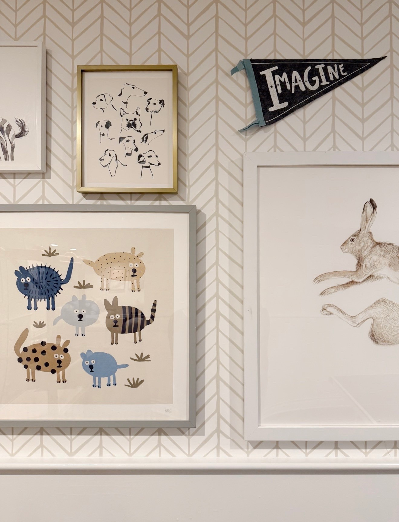 This gorgeous wallpaper in our playroom is on clearance and soon to be discontinued! I absolutely love it. So pretty on its own but also gorgeous layered with art!
