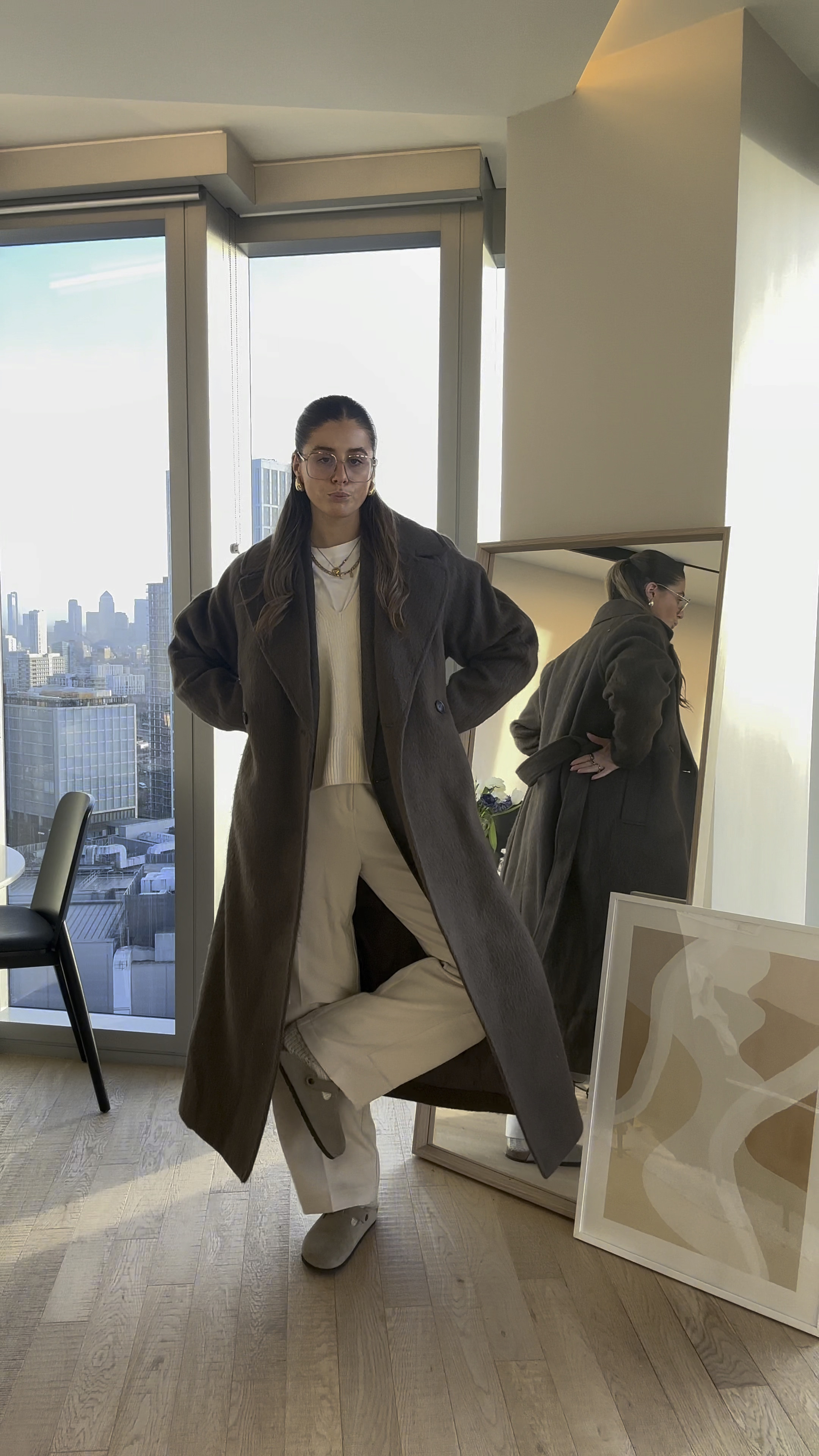 cream tailored trousers, white tshirt, knit sweater vest, brown blazer, wool coat, birkenstock bostons

#LTKMostLoved #LTKstyletip #LTKworkwear