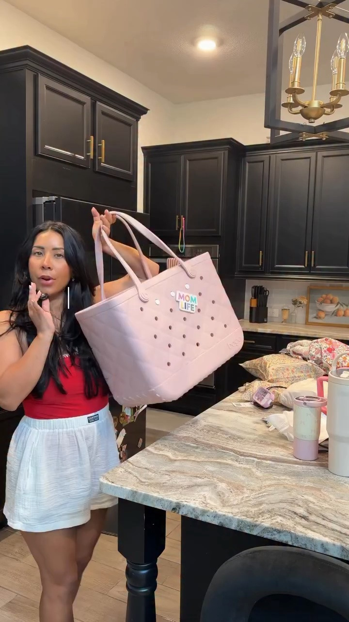 Pack with me for a day at the waterpark with my babies!! The perfect bag for summer with kiddos🤝 @boggbags 

Comment “shop” for links

#momlife #summer #boggbag #waterpark #packwithme relatable, summer trip, mom of 2