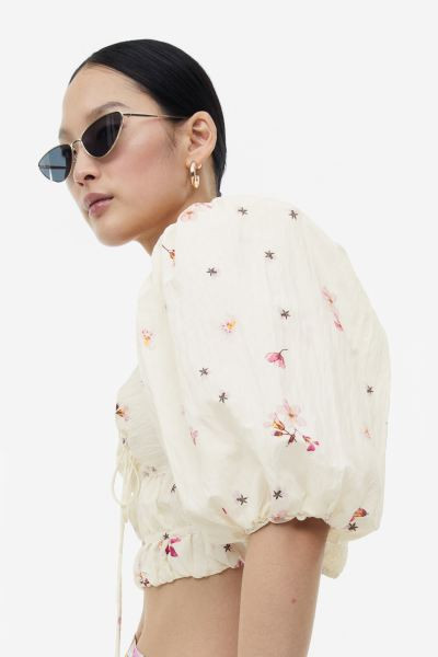 Top cropped con manga puffy | H&M (FR, IT, ES, PT, BE)