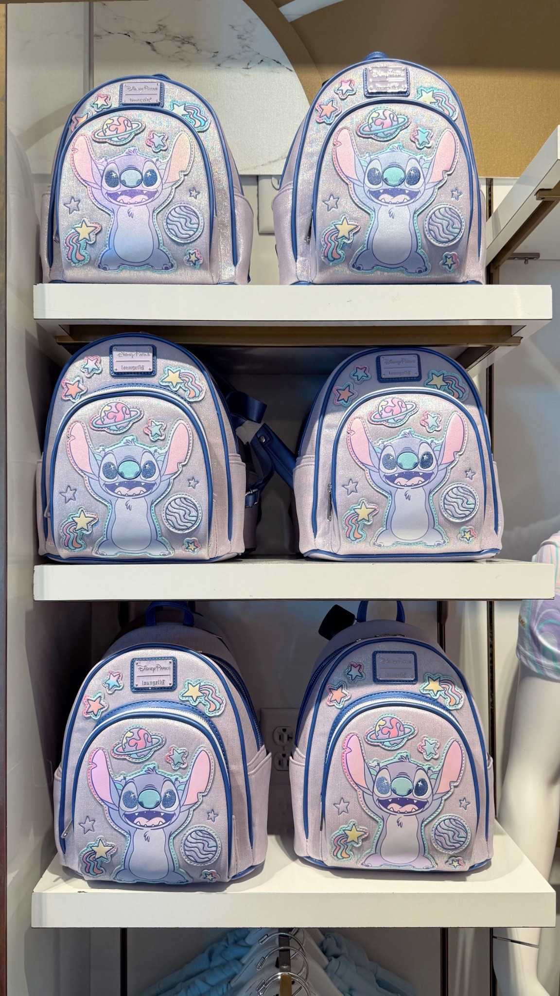 Loungefly backpack at Disney World - pastel stitch 

#LTKFamily #LTKKids #LTKTravel