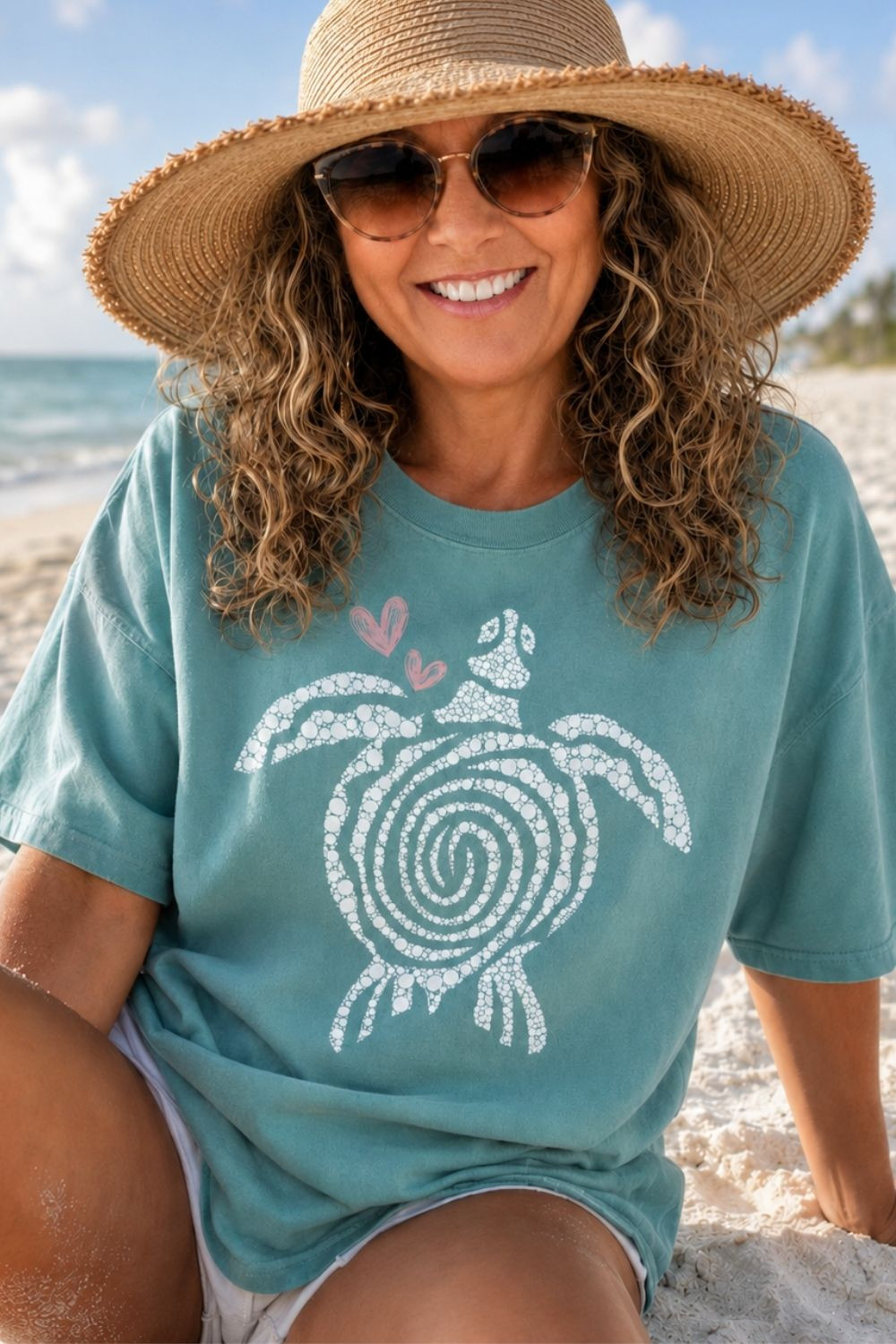Chillin at the beach in a Comfort Colors sea turtle shirt. It's nesting turtle season. 

The sea turtles dig holes in the sand and lay their eggs. They then cover the eggs with sand to protect them from predators and harsh temperatures. 
#beachshirt #comfortcolorssummershirt #summertshirt 

 #LTKootd #LTKSeasonal #LTKOver40