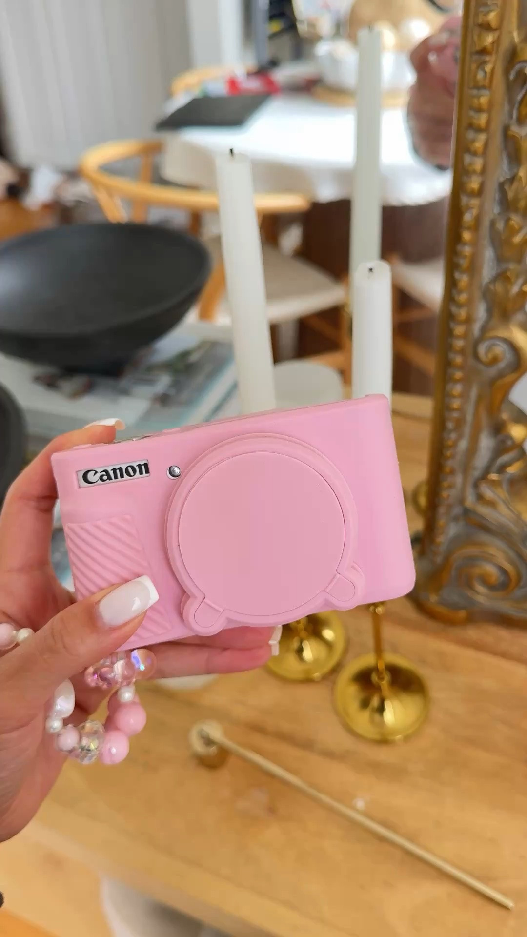 My camera Canon sx740!! This is what I got a couple years ago bc the Canon G7X was always out of stock - it’s very similar and at a better price point. It’s out of stock at MSRP now but available marked up a bit on a few websites. 

The pictures always turn out so good! I always force the flash no matter what time of day it is and the pics always turn out perfect. It’s a little less sharp than the g7x but has that soft glam effect on all pics

Also linked the pink cover and wrist charm!