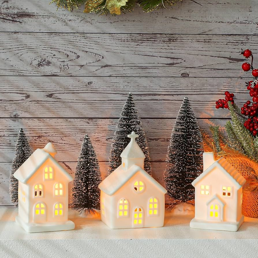 7PCS Christmas Village Sets - 3 LED Lighted Ceramic White Houses with 4 Decorative Christmas Tree... | Amazon (US)