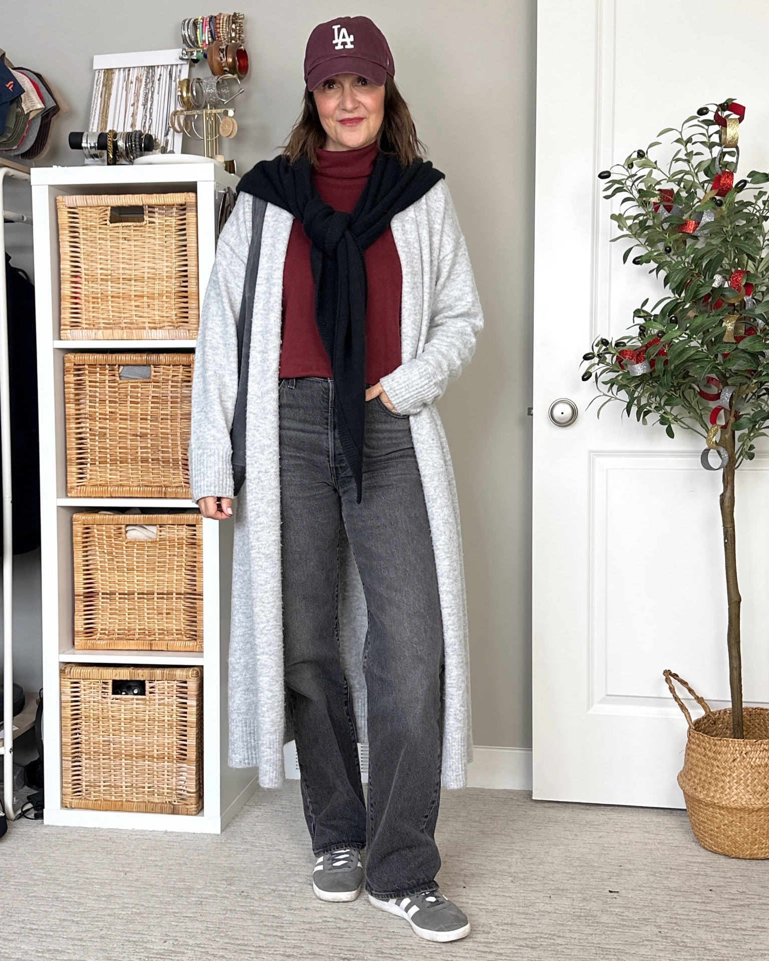 Grey and burgundy errands outfit. This is the third color I have in this fleece turtleneck, it’s so soft and warm, fits tts. My jeans are 10% off 🇨🇦 20% off 🇺🇸 and fit tts. My scarf is cashmere and pretty expensive but so soft and luxurious feeling, also on sale!
Adidas sneakers fit a half size big, in women’s sizes go down 1/2, in men’s go down 1.5. 
Also linked my ball cap, suede bag and the burgundy sneakers I am still debating keeping. 
Linked my fave Merit lip oil, my shade is sangria 
Long cardigan is old, I’ll link similar. 


#LTKCyberWeek #LTKFindsUnder50 #LTKShoeCrush