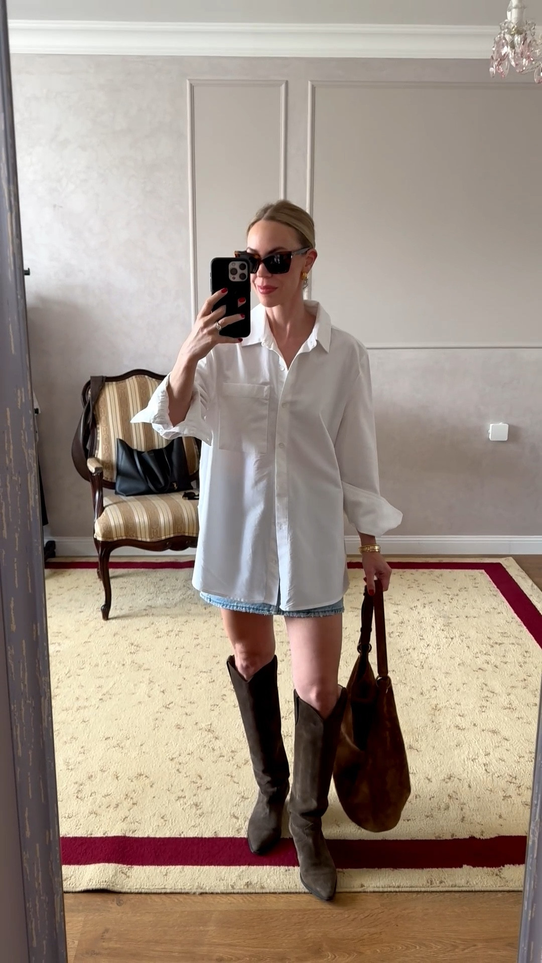 Denim skirt on sale!

Spring outfit, oversized white button down shirt with @Levi's denim skirt, western boots, suede YSL bucket bag 

#LTKSpringSale #LTKSaleAlert #LTKOver40