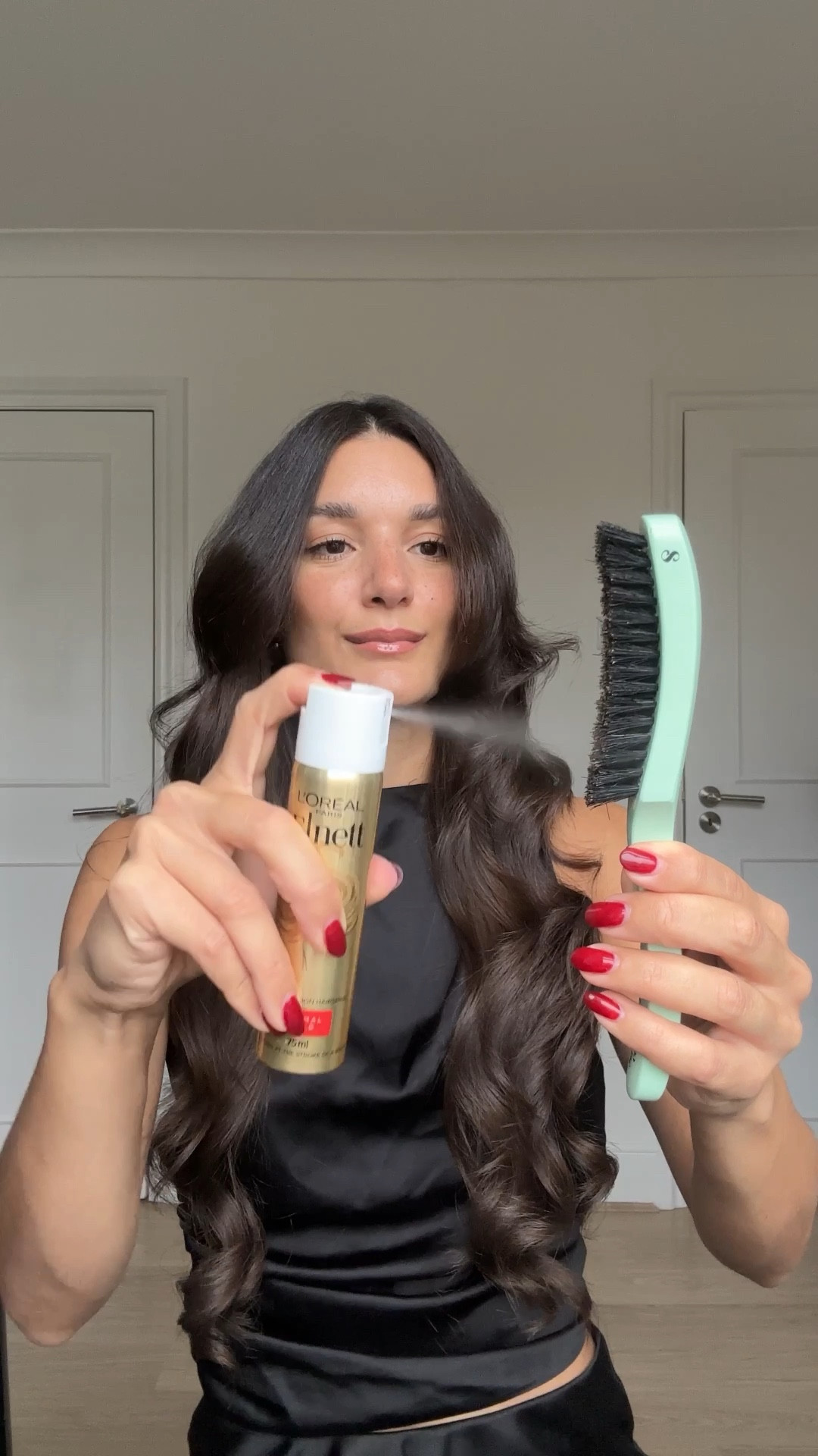 How to hide your hair tie using your hair. Apply hair spray to a smoothing brush to help achieve that snatched look. 

#LTKbeauty