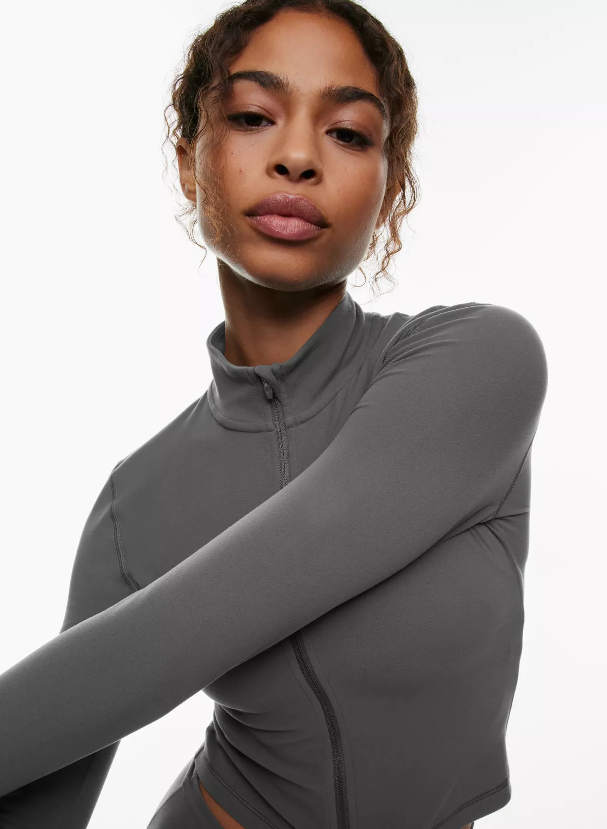 TNABUTTER™ LIMIT ZIP LONGSLEEVE | Aritzia