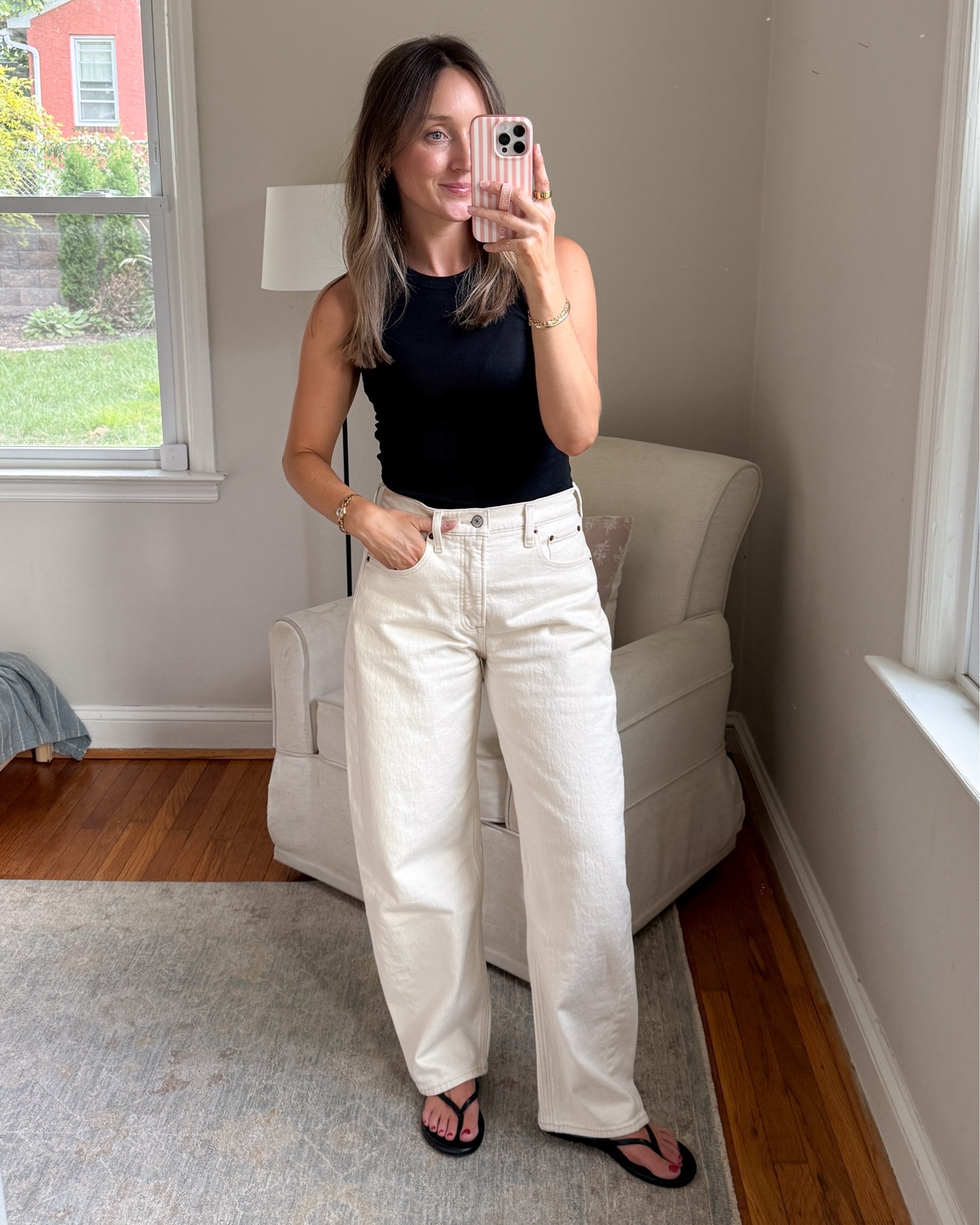 Wearing a size small in the tank and a 26 regular in the ecru jeans￼