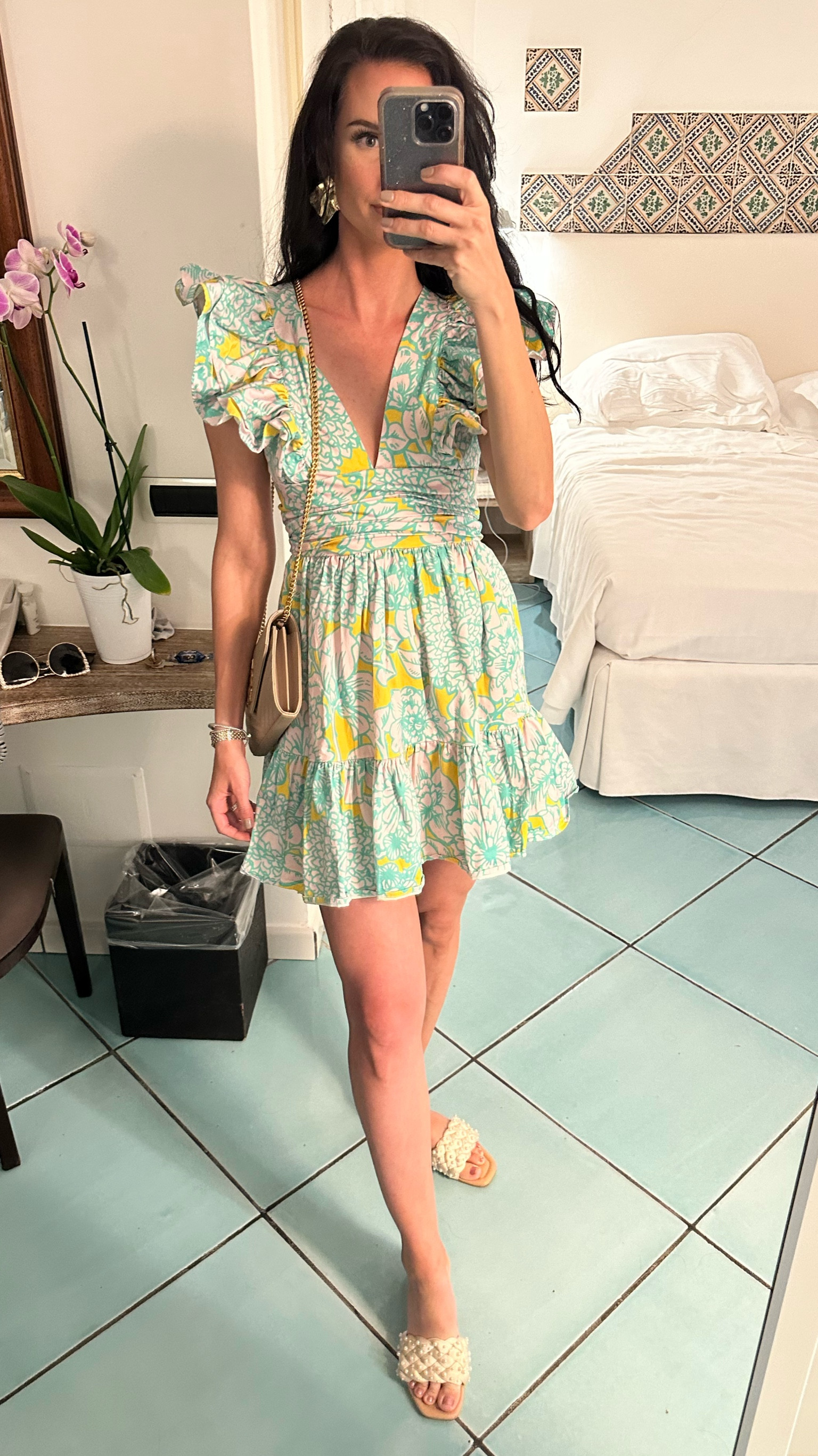 Cute little mini dress with ruffle sleeves for dinner in Amalfi!

Sundress. Mini dress. Vacation outfit. Slides. Sandals. Gold earrings. 

#LTKtravel #LTKeurope #LTKshoecrush