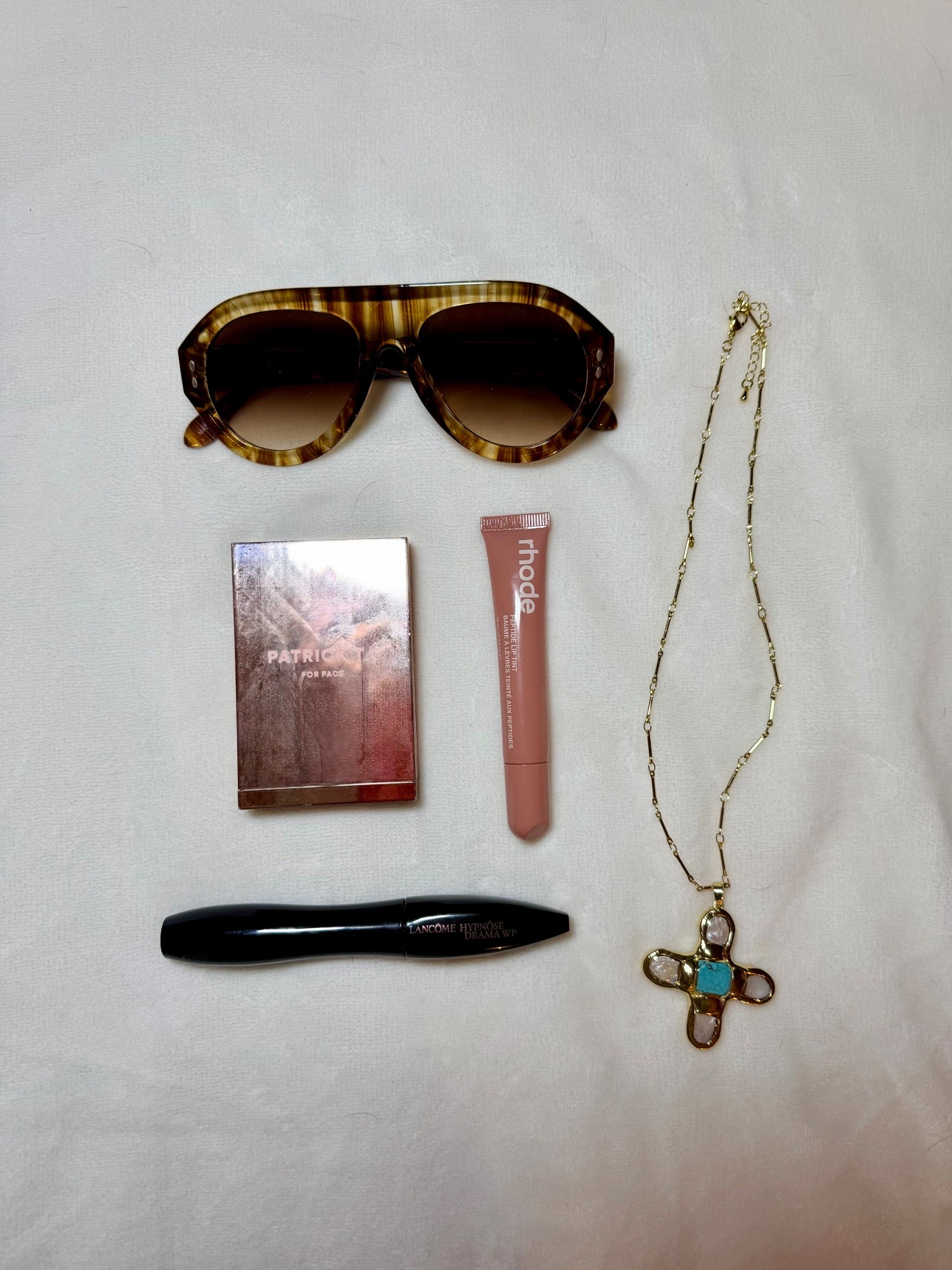 Essentials 
#springessentials #rhode #necklace #makeup 

#LTKgrwm #LTKBeauty #LTKSpringSale