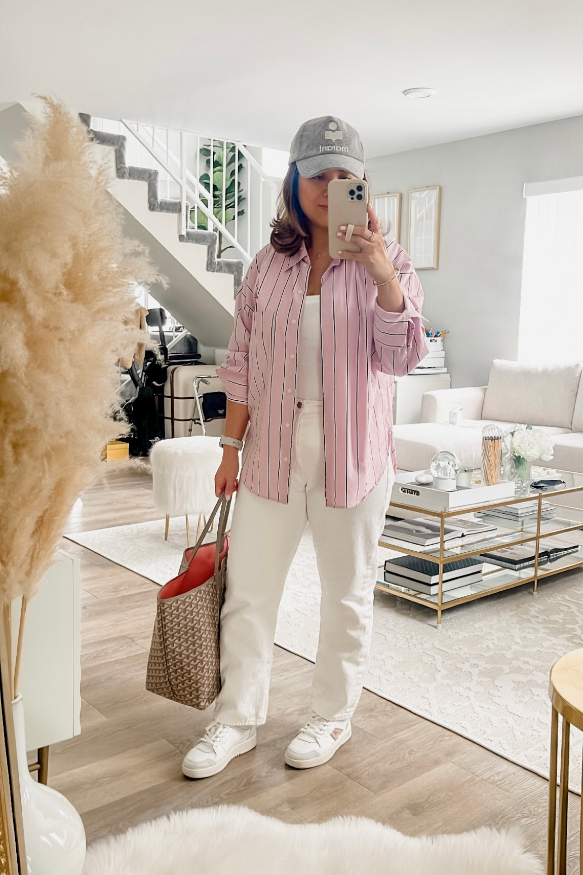 Pink button down shirt in medium 

white jeans

axel arigato sneakers 

#LTKstyletip #LTKshoecrush