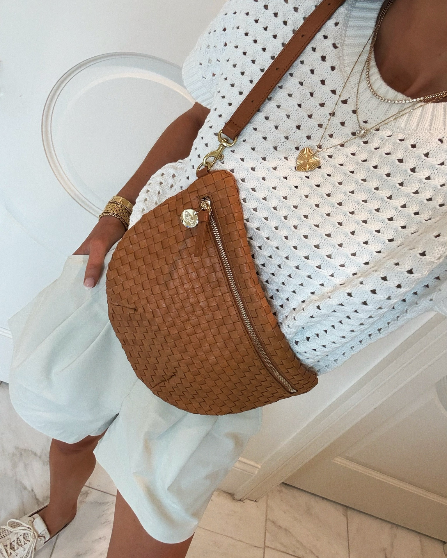 Casual cute summer outfit that's mom friendly. I'm wearing size small in my top and xs in shorts which fit tts