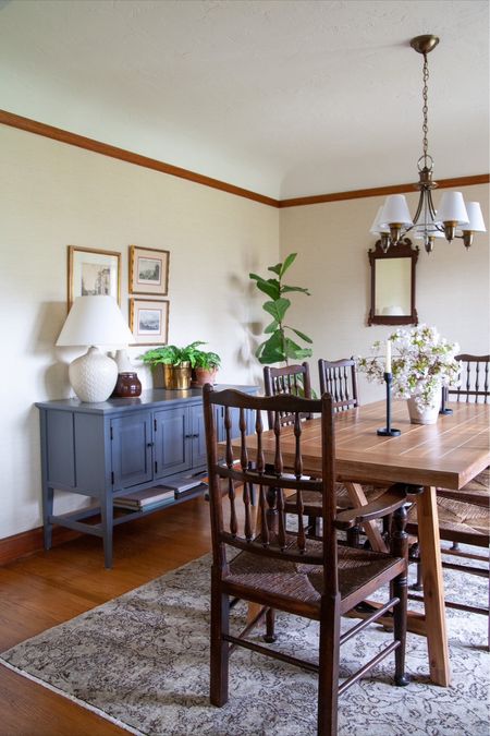 Dining room wallpaper is done! Linking shades, table, and similar vintage rugs.

#LTKhome