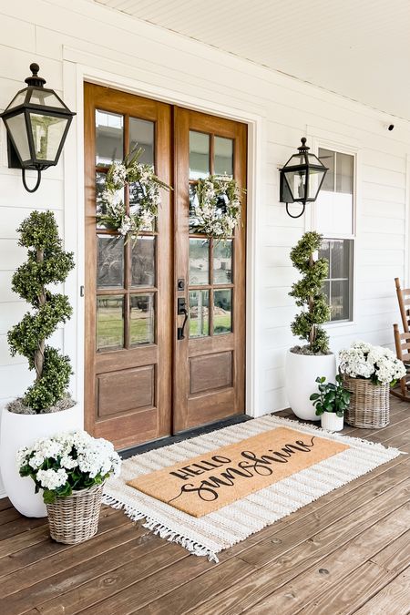 Spring front porch front door home decor and accents wreaths lantern wall sconce lighting light fixtures spiral boxwood faux artificial topiaries large oversized white planters basket planters faux geraniums white hydrangeas double layered welcome doormat and jute scatter rug hello sunshine Etsy nearly natural pottery barn target overstock Amazon 

#LTKFind #LTKSeasonal #LTKhome