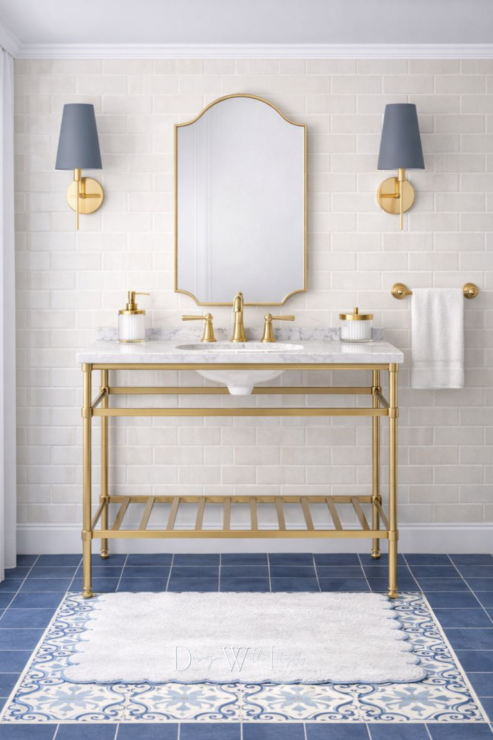 Classic elegance meets modern restraint in this beautifully balanced bathroom design. A brass console-style vanity creates an open, furniture-like feel, while crisp white subway tile and rich blue flooring ground the space with timeless appeal. Soft blue accents, tailored lighting, and warm metal finishes add just enough contrast to keep the palette feeling fresh and inviting.

This space was inspired by a digital mood board and generated through AI as a source of visual inspiration, showcasing how traditional materials and thoughtful styling can come together in a clean, elevated way. Tap through to shop the look on LTK and explore the pieces that bring this bathroom to life.

Shop the look on LTK.

#bathroomdesign #interiordesign #shopthelook 

 #LTKHome