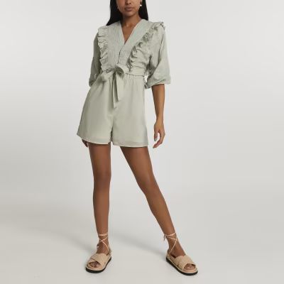Details
2 in 1 Playsuit Button front fastening Drawstring waist Crop shirt Long sleevesFrill... | River Island (UK & IE)
