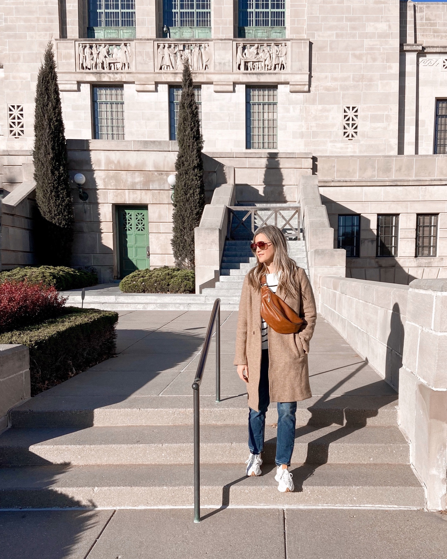 Oh man, am I glad I scored this gorgeous wool overcoat during the Black Friday sales. I love it!! Today I wore it with a striped sweater, boyfriend jeans, and sneakers for our adventures around the city. (This leather belt bag is from @azariabrand and I can’t tag it in the LTK post).

Stay tuned for a post coming soon comparing different jean styles. I just got a bunch of new styles to show and compare!

#LTKSeasonal #LTKtravel #LTKstyletip