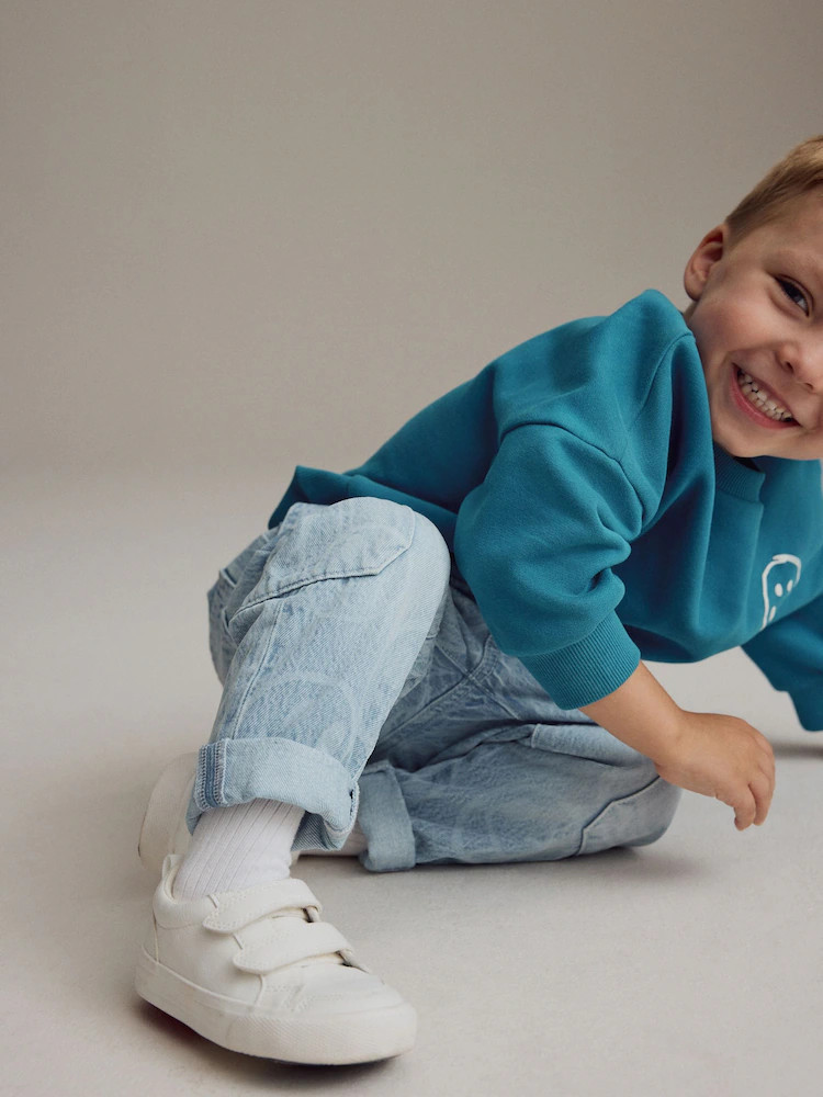Kaufe Sie  Hellblaues glückliches Gesicht - Jeans aus 100 % Baumwolle mit Laserprint (3M.–7J.... | Next EU