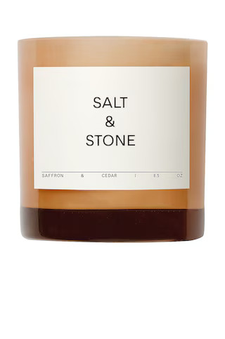 SALT & STONE Saffron & Cedar Candle in Saffron & Cedar from Revolve.com | Revolve Clothing (Global)