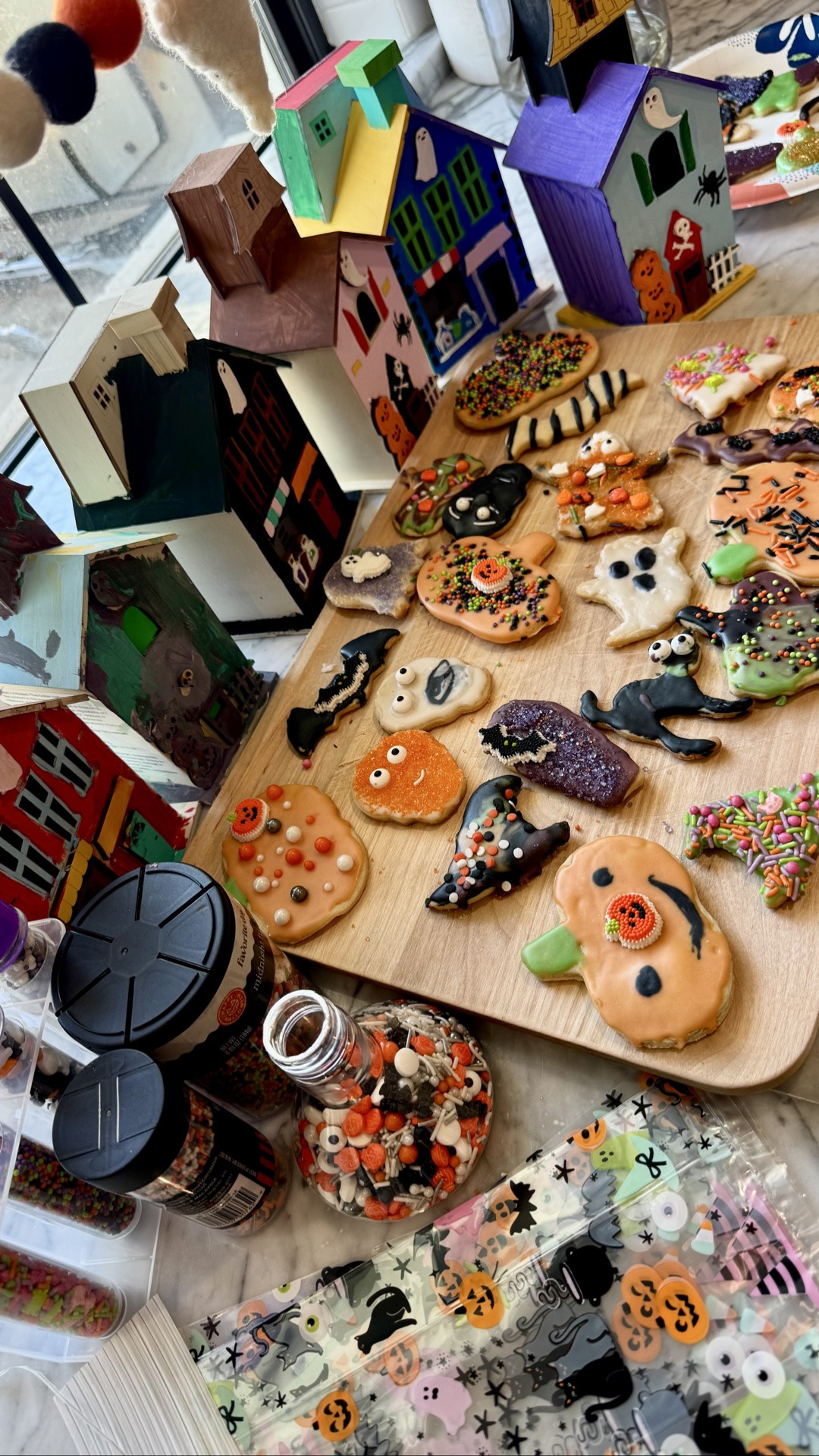 Super easy and simple Halloween party we threw for the kids and their friends! Decorating cookies and painting these light of haunted houses kept them busy for hours