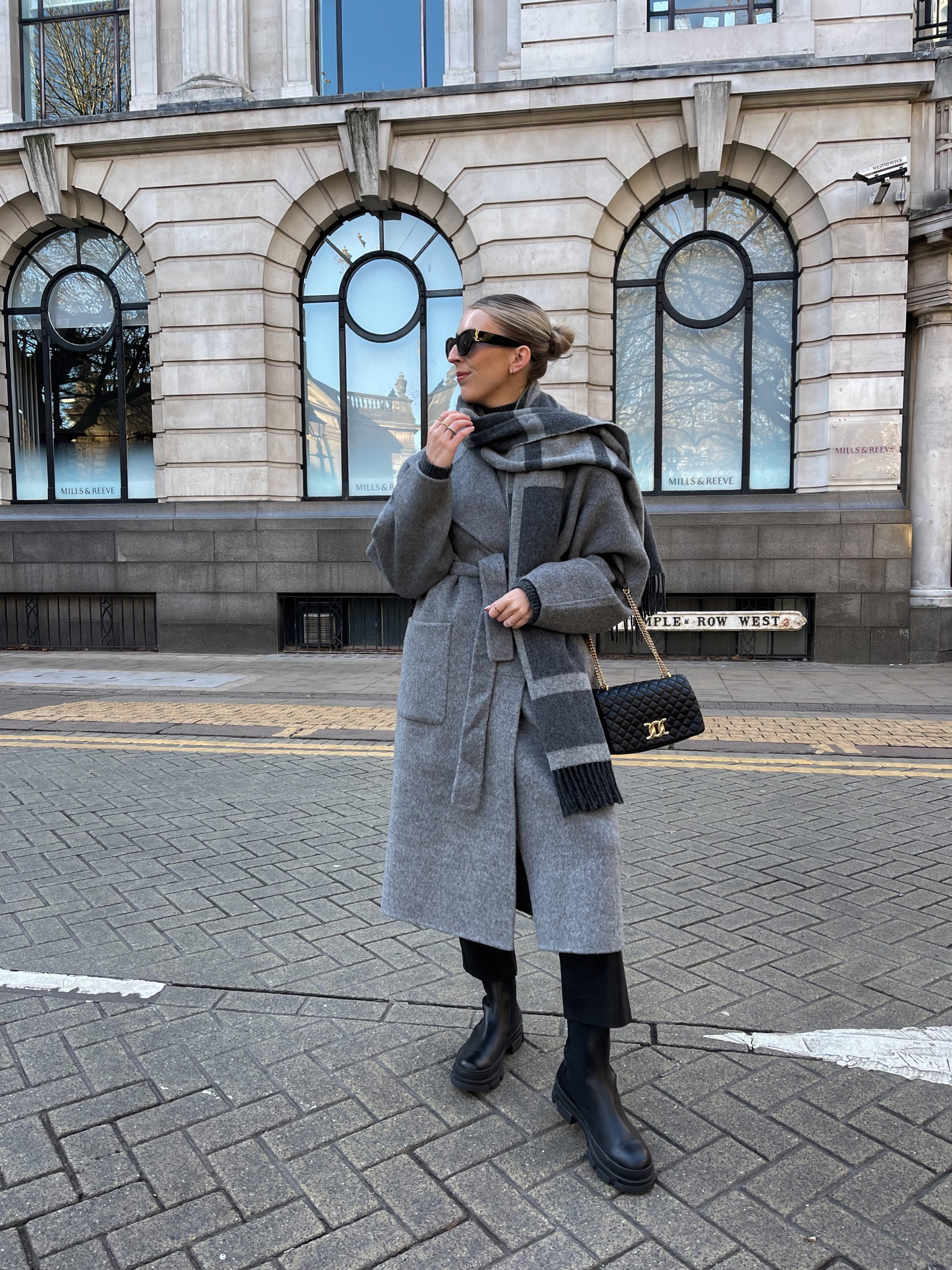 Grey wrap coat, black wide leg trousers, black chunky boots, crossbody chain leather bag, striped scarf, sunglasses

#LTKstyletip #LTKSeasonal #LTKeurope
