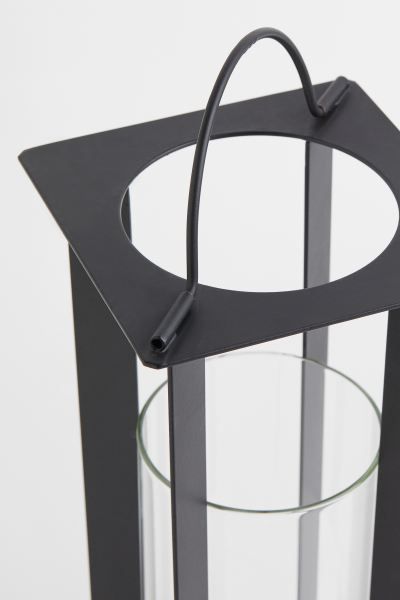 Large candle lantern in metal and glass designed to hold a pillar candle. Handle at top and small... | H&M (US)