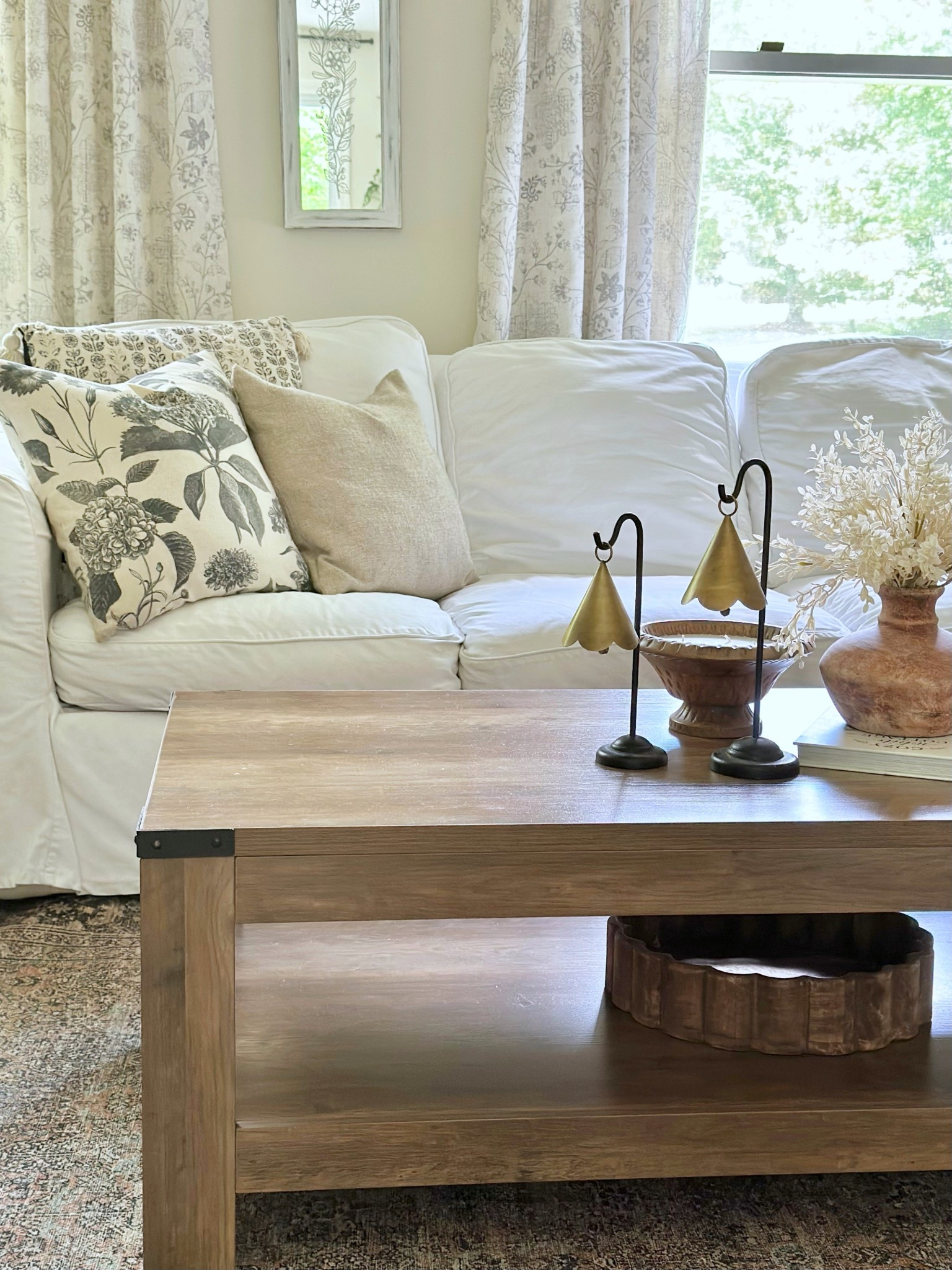 Living room makeover! Coffee table, sectional, throw pillows, coffee table decor, curtains and more! 

#LTKFindsUnder100 #LTKStyleTip #LTKHome