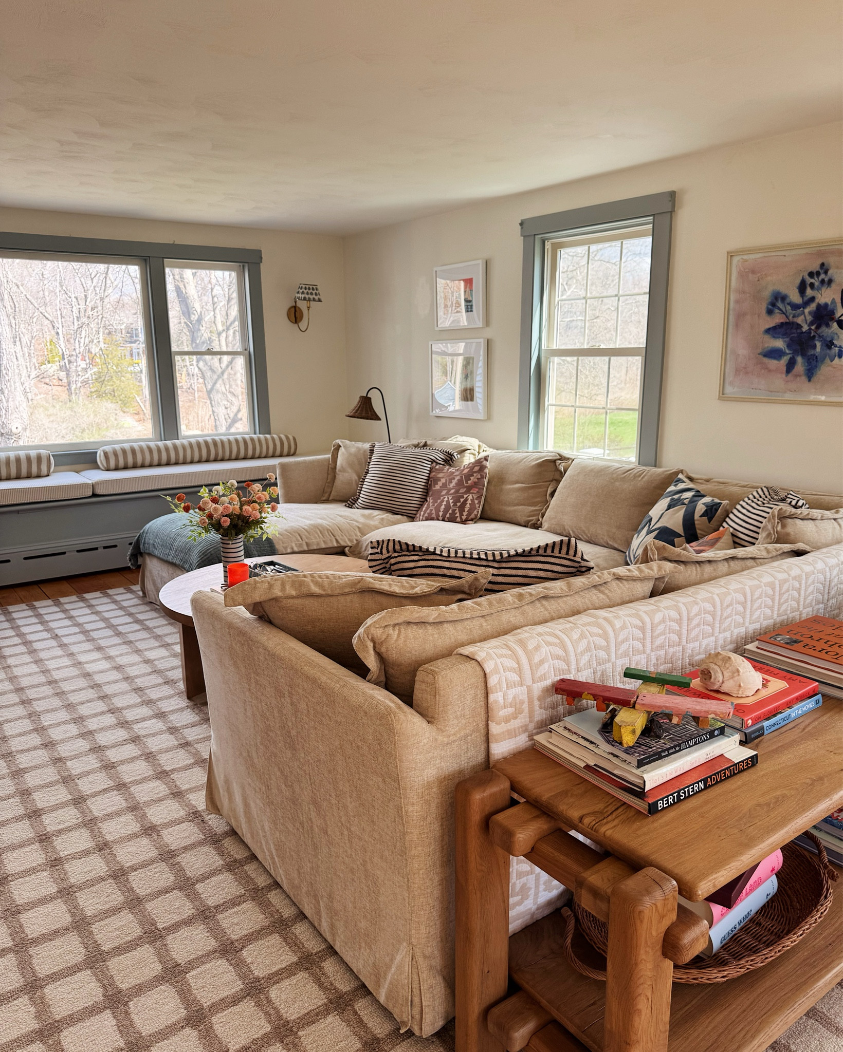 i painted the window trim blue (finally!) in our living room! not sure why i was afraid to do it because it looks so much better now 💙

#LTKHome