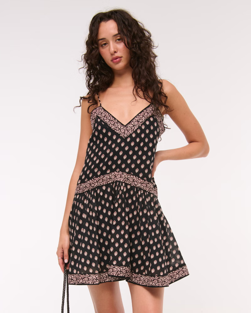 Women's V-Neck Flowy Mini Skort | Women's Dresses & Jumpsuits | Abercrombie.com | Abercrombie & Fitch (US)