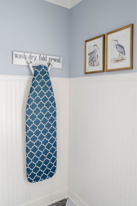 My newly decorated laundry room features white bead board. I like hanging my ironing board as part of my decor.

#LTKHome