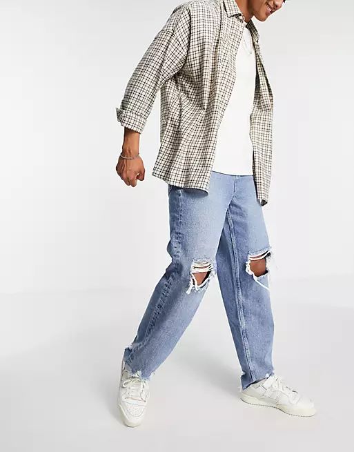ASOS DESIGN baggy jeans in 90's mid wash with heavy rips | ASOS (Global)