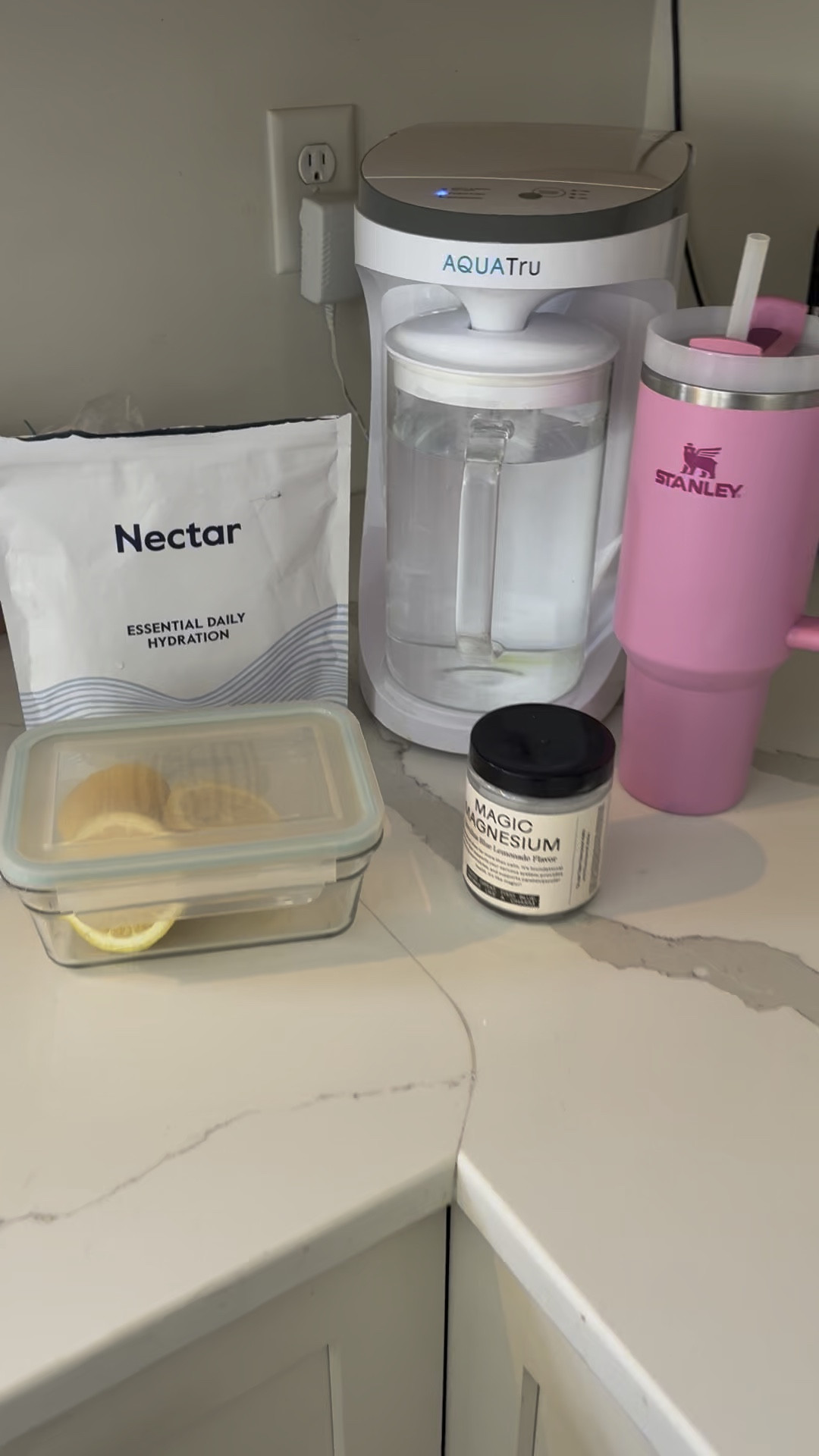 My hydration essentials! 👏🏻

First up is my AquaTru countertop water filter. 💧 With concerns about contaminants like lead, chlorine, and PFAS in tap water, having a reliable filter is more important than ever. AquaTru’s 4-stage reverse osmosis system removes over 20 times more contaminants than leading pitcher filters, ensuring pure, clean, and delicious water right from my counter. Plus, it adds essential minerals like calcium and magnesium, boosting the water’s alkalinity for added health benefits.  ￼
To keep hydrated and energized, I’ve been loving Nectar’s electrolyte hydration packets. These clean, organic packets provide natural energy, improve mood, boost focus, and strengthen immunity. I mix one into my AquaTru-filtered water for a refreshing and health-boosting drink.

I also add half a fresh-squeezed lemon and a scoop of Wooden Spoon Herbs’ Magic Magnesium powder to my drink. This organic supplement supports healthy energy levels, bolsters gut health, strengthens muscles and bones, and promotes a sense of calm. It’s a simple addition with big benefits.  ￼

Staying hydrated has never been this enjoyable and beneficial! 💦 

#HydrationHacks #WellnessJourney #CleanLiving #HealthyHabits #StayHydrated