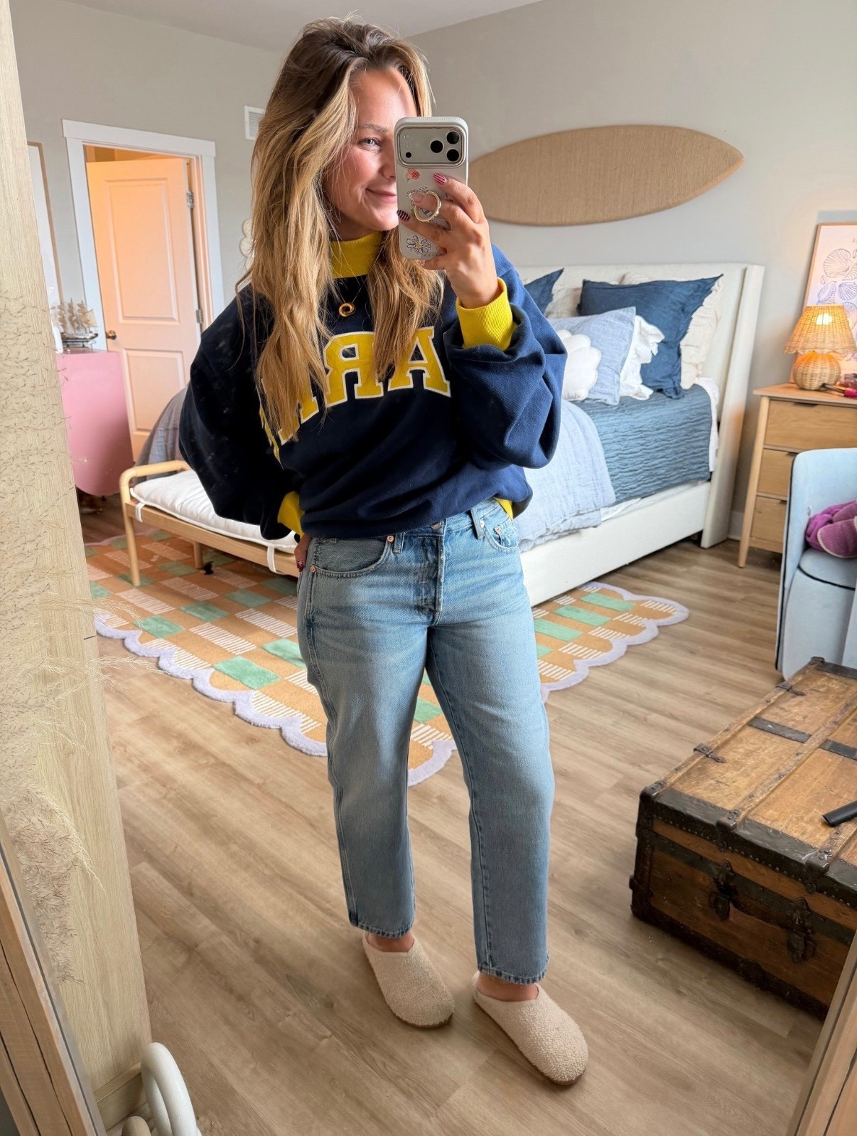 Cozy but still put together 💙💛

Layered this sweatshirt for a little contrast (and warmth), paired with straight leg denim that actually fits through the hips + thighs without losing shape. Finished it off with the softest neutral clogs for that effortless, weekend vibe.

Easy layers. Good denim. Repeat outfit energy.

#ltkstyle #ltkdenim #casualoutfit #everydaystyle #layeredlook #straightlegjeans #cozyvibes #momstyle #springlayers #preppystyle