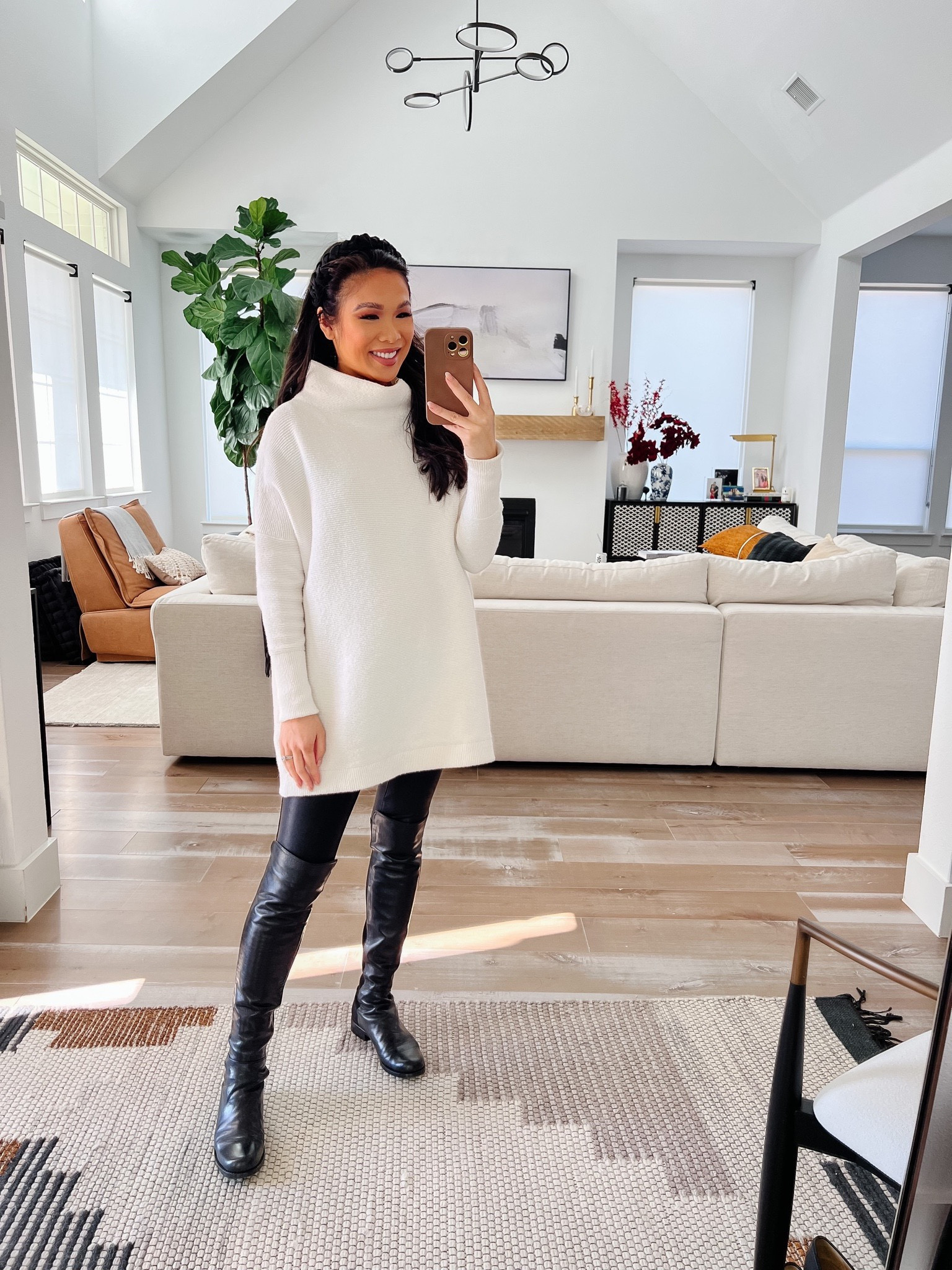Oversized tunic sweater that is part of the NSALE! I’ve had this for 7 years and love it. Perfect for winter and wearing over leggings. These faux leather leggings are on sale, too. Linking similar styled boots 

#LTKsalealert #LTKstyletip #LTKxNSale