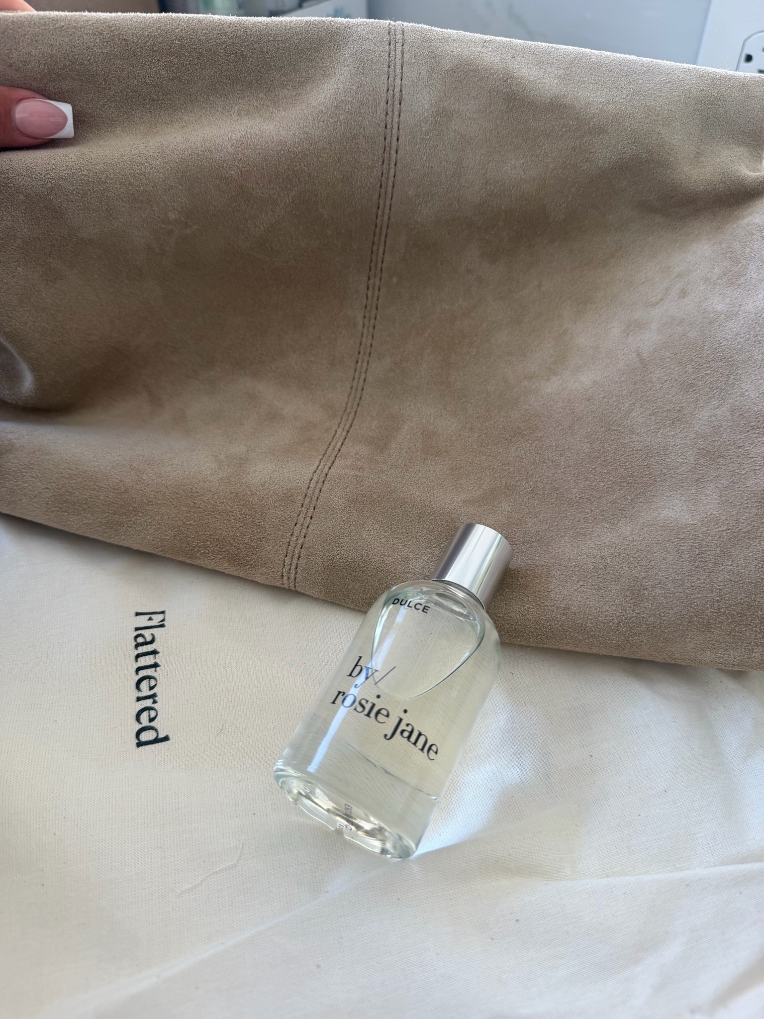 My recent buys! The clutch comes in so many beautiful colors & this perfume is the best vanilla ever x enjoy!