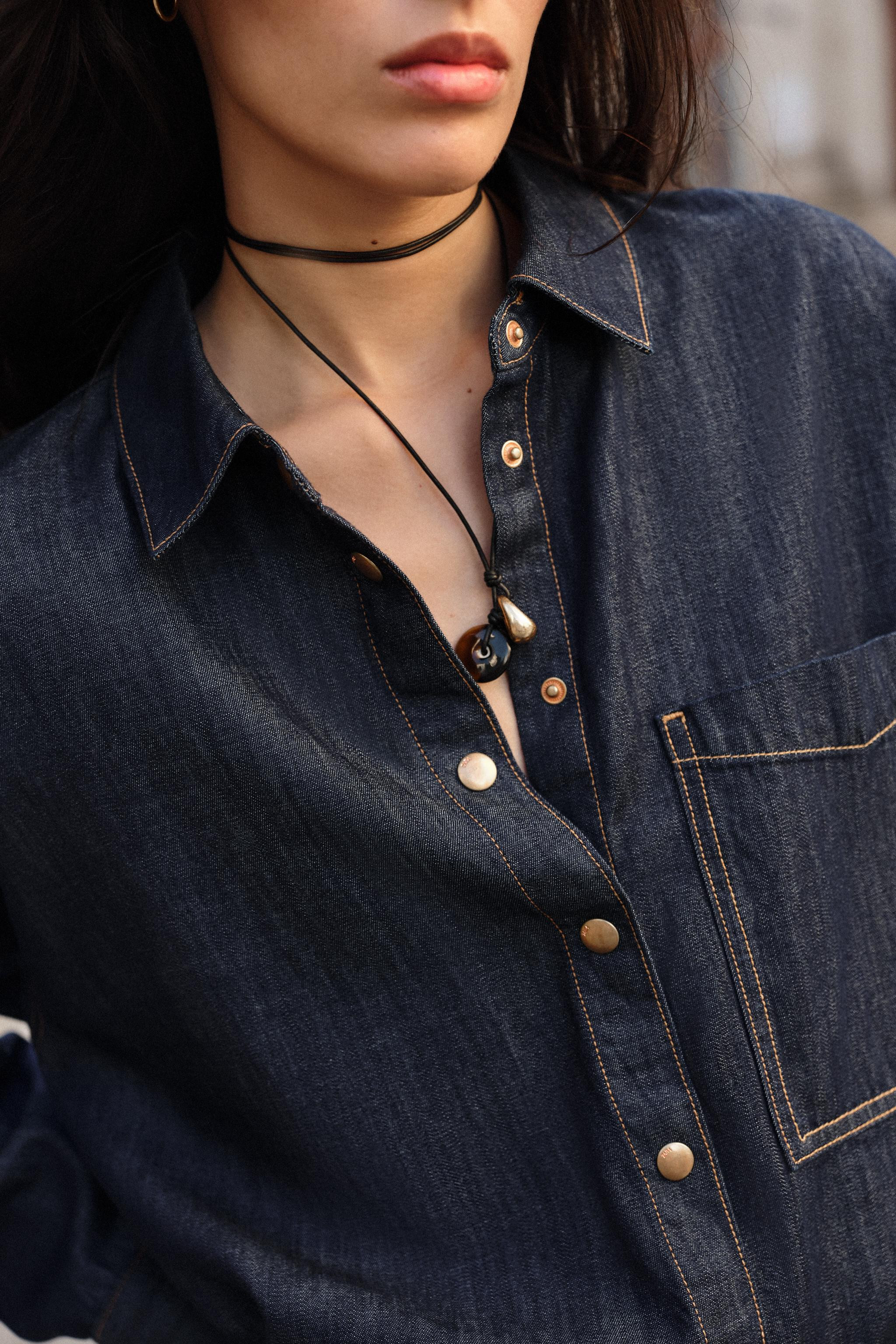 Roomy shirt with lapel collar and long sleeves. Front patch pocket. Front snap button closure. | Zara US