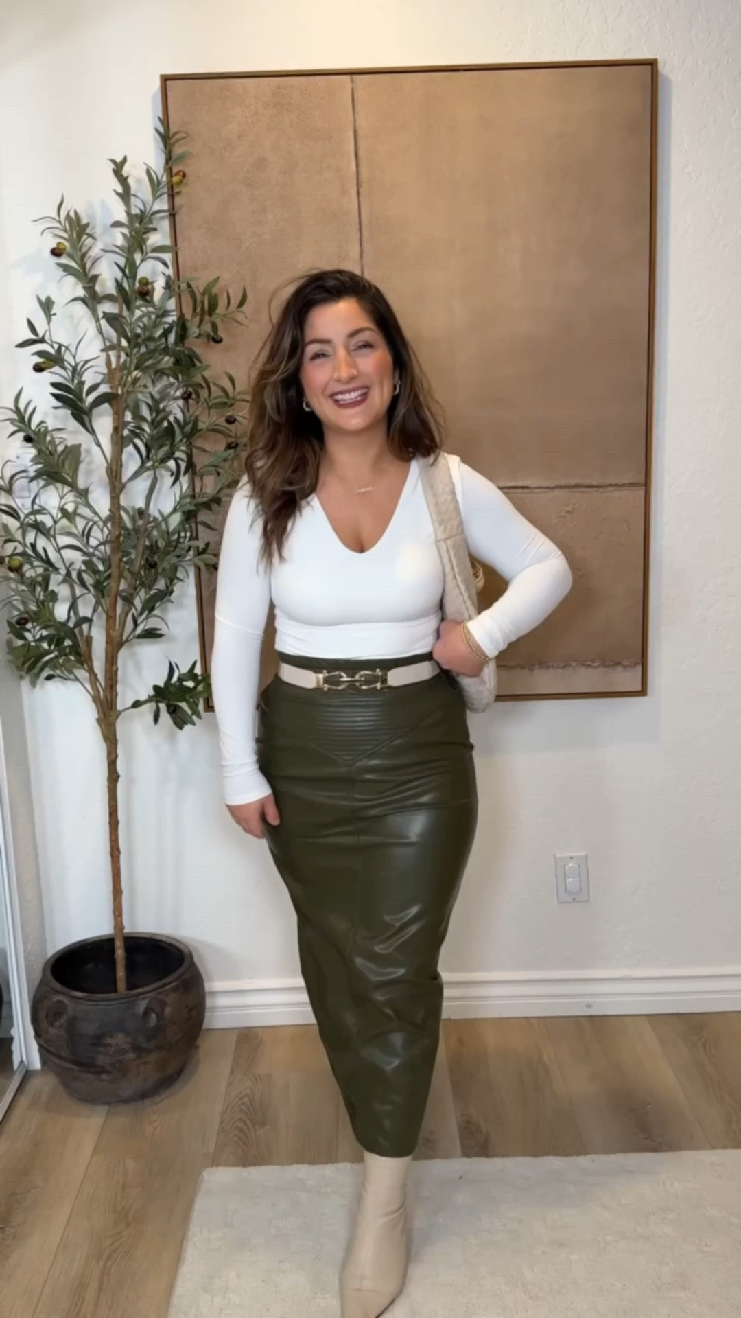 Faux leather skirt from Amazon! MUST for fall!! 

50% off today with code: 7AQXS9VF

Tops size small
Skirt size small but should be in my true size medium! 

Petite friendly!!
5'0" 140lbs 

#LTKSeasonal #LTKSaleAlert #LTKPetite