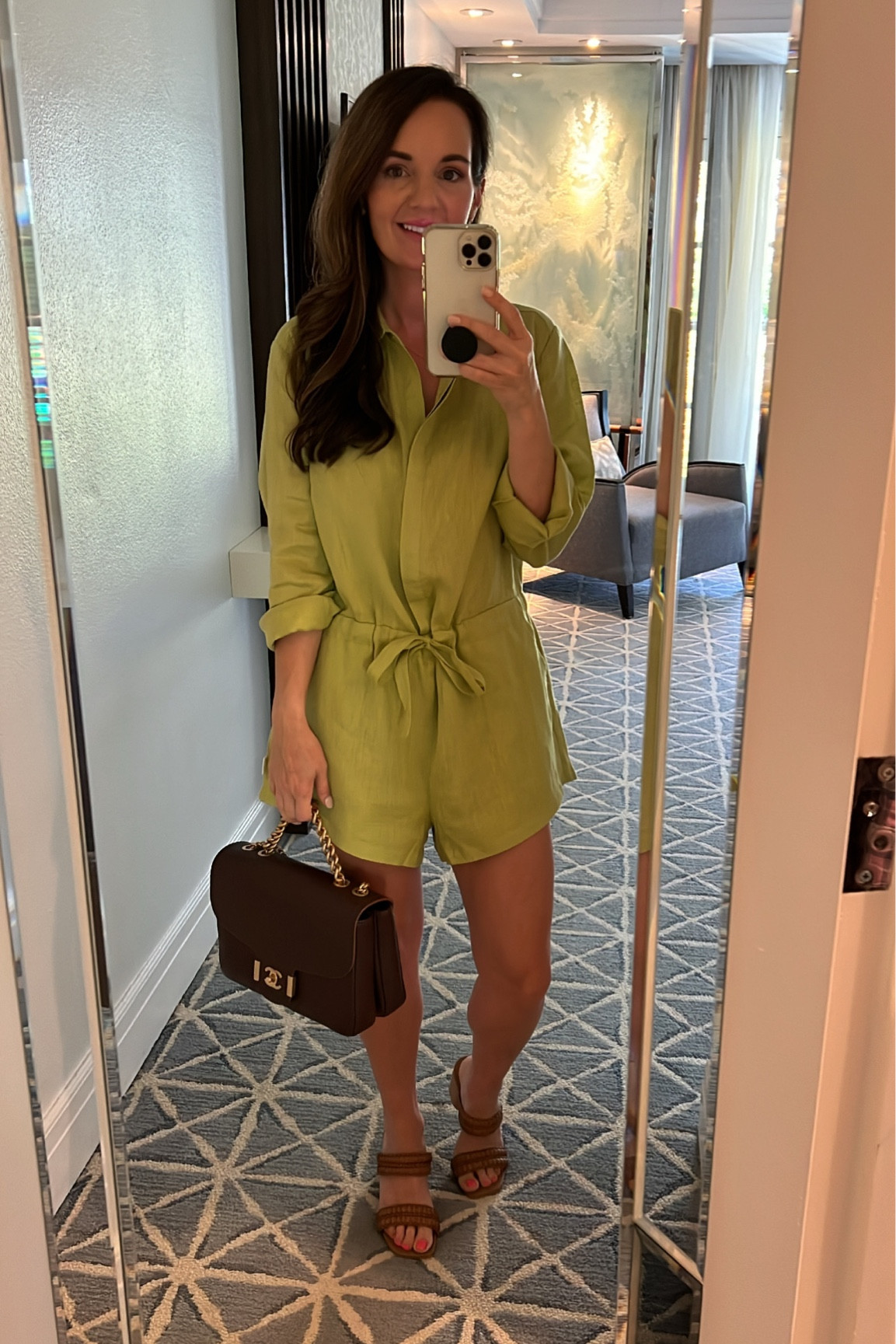 Linen romper with a tie waist and pockets 
