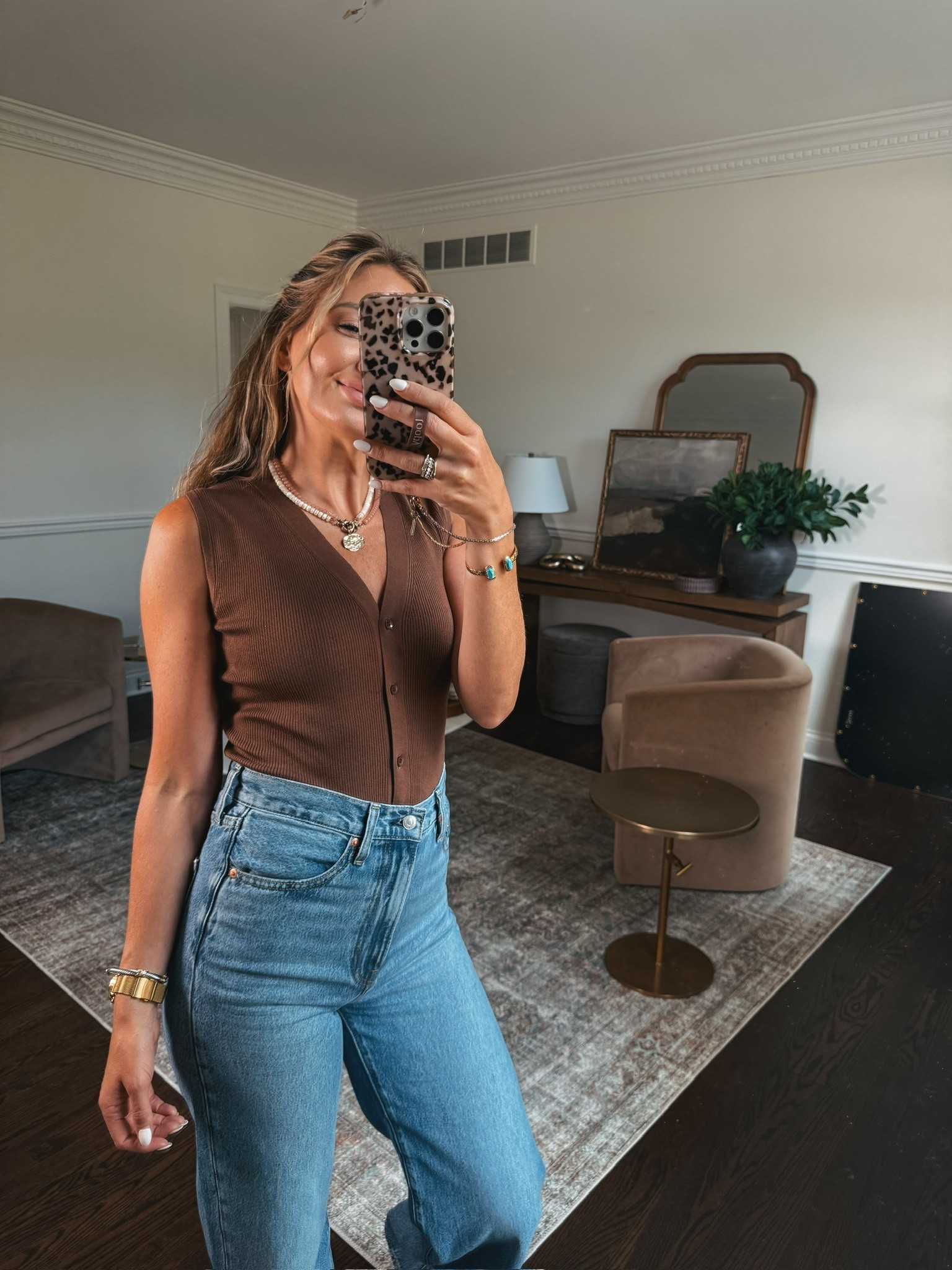 Late summer/early fall outfit idea. Button down tank. Jeans. Trending fall. Brown. Denim.

#LTKgrwm #LTKmorningroutine #LTKootd
